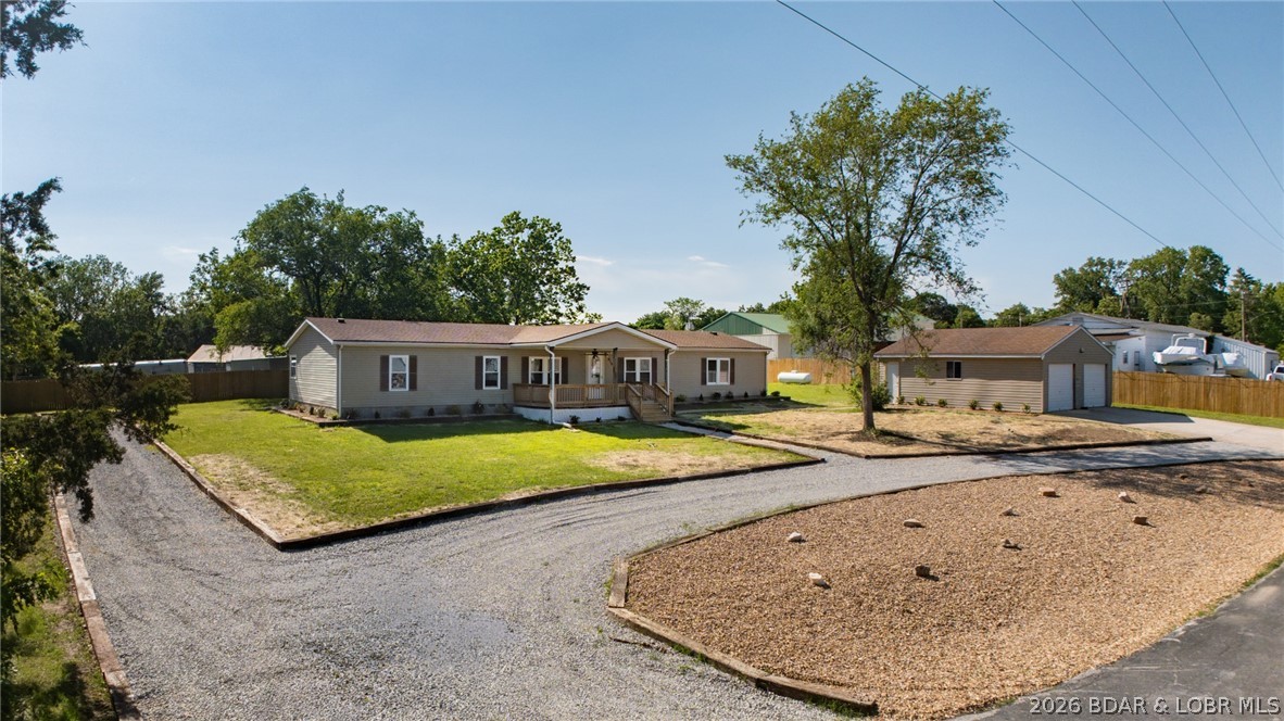 Welcome home to this beautifully remodeled 3-bed, 2-bath home in the heart of Warsaw! Offering approximately 2,100 square feet, this home features modern finishes, an inviting open floor plan, generously sized bedrooms, and a fully updated kitchen with brand-new appliances. A bright and inviting sunroom adds the perfect bonus space that is ideal for relaxing with your morning coffee, enjoying natural light year-round, or creating a cozy reading nook. Enjoy peaceful mornings on the covered front porch and unwind in the evenings on the large back deck overlooking a spacious yard. Situated on a quiet dead-end street, this property offers both privacy and convenience. Additional highlights include a detached 2-car garage and a large lot with plenty of room to enjoy outdoor living. Just a short walk to downtown Warsaw’s shops, dining, and amenities, this move-in ready home is the perfect blend of style, space, and location. Don’t miss your chance to make it yours! Call today!