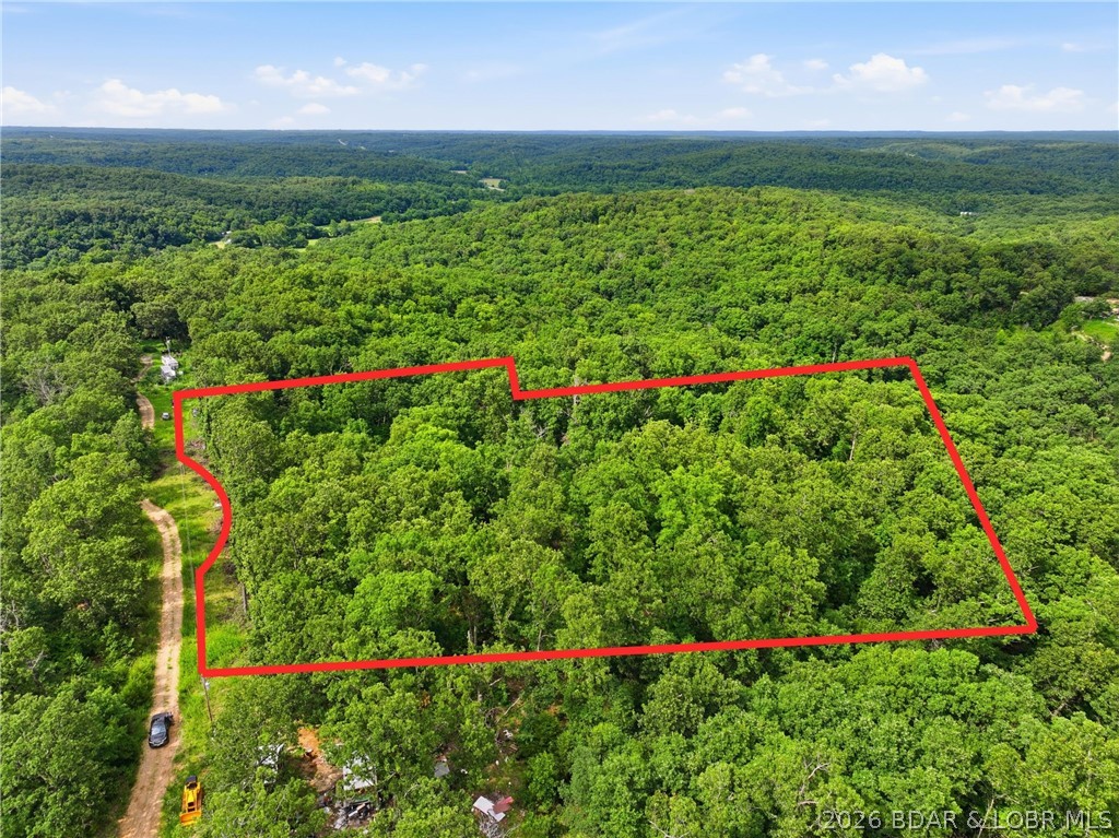 Discover the perfect setting for your dream homestead on this beautiful 7.8-acre property! Approximately 2 acres are level and cleared, providing an ideal homesite, while the remaining acreage features a picturesque natural landscape with mature trees, a peaceful creek, and plenty of room to explore or expand. A little additional brush hogging could further open the property and enhance its already impressive potential. Utilities are available at the road, making it even easier to bring your vision to life. Whether you're planning a custom home, hobby farm, horse property, gardens, or simply seeking the privacy and tranquility of country living, this versatile acreage offers endless possibilities.