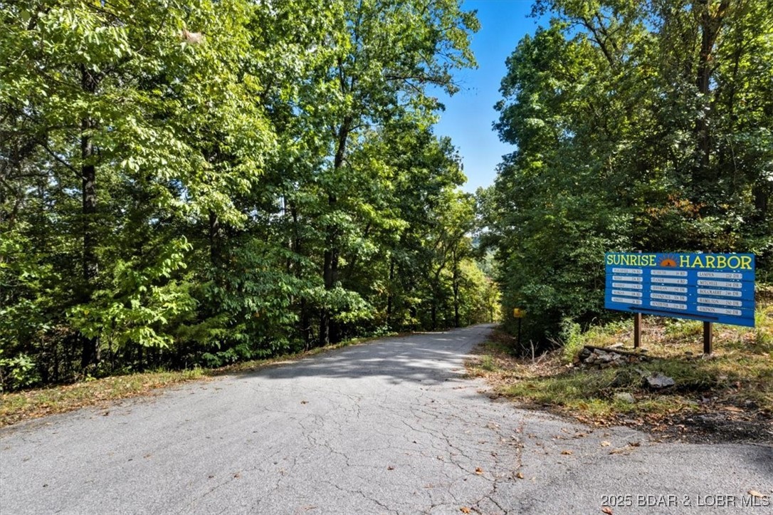 Lakefront opportunity on the 34 MM! This wooded cove location offers beautiful views and just over 6 acres ready for you to build your dream home and enjoy true lake living. The property includes an old cabin and access to a shared well for water. Don’t miss this chance to own your own slice of lakefront paradise surrounded by nature and peaceful lake views! (Old cabin located on property).