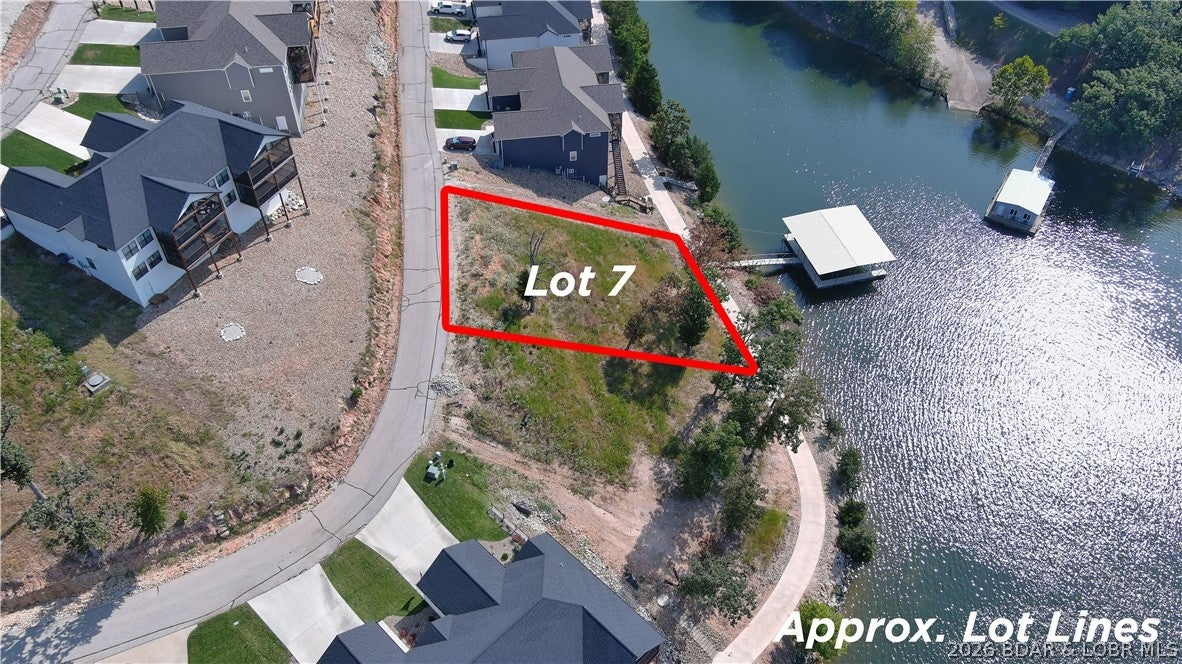 Amazing opportunity to purchase a lakefront lot in a well established subdivision. This lot will allow you to build a private home or a villa in The Villas of Tuscany Subdivision. This location is one of the most ideal lots within the subdivision. Amenities are already in place with water & sewer, internet access through Spectrum. You will enjoy the amazing pickle ball court, community pool & bath house, and golf cart path down to the community docks. Note- proposed structure shall be approved by Architecture Review Committee and landscaping will also need to be approved. (Subdivision will maintain landscaping of home, just as a Villa). NO PRIVATE WATER RIGHTS ON THIS LOT! Buyer will have to get a slip in community dock.