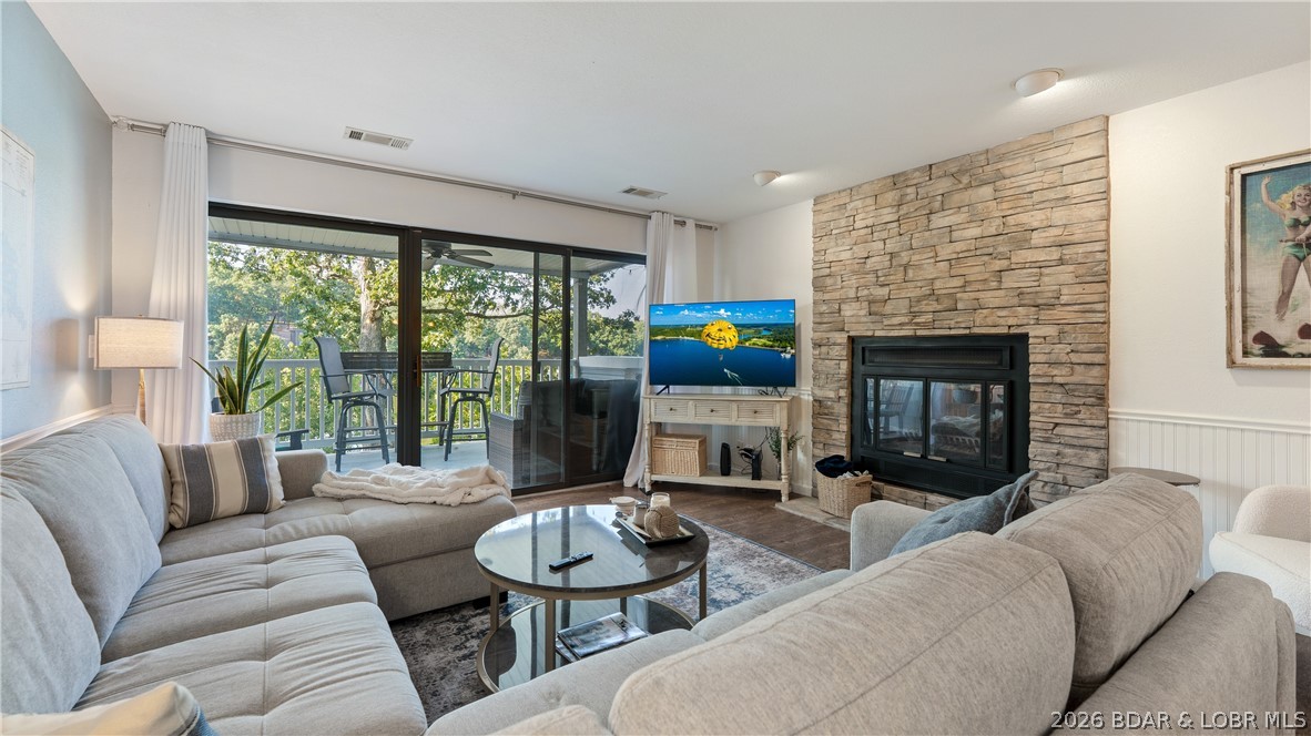 Enjoy the best of Lake of the Ozarks from this beautifully updated 2-bedroom, 2-bath condo in the heart of Osage Beach! This prime location puts you just minutes by water from many of the lake's most popular waterfront attractions and within walking distance of Michael's Steak Chalet. By land, you'll also enjoy easy access to golf, shopping, dining, and entertainment. Inside, the recently updated interior features granite countertops, stainless steel appliances, a tiled backsplash, LVP flooring, and beautifully remodeled bathrooms. The spacious, functional floor plan offers a private primary suite with an attached bath and direct access to the spacious deck overlooking the beautiful Lake of the Ozarks. Other highlights include this unit being the closest to the boat and swim dock! Selling turn-key, this condo is ready to enjoy immediately. The slip lease is included, with a boat and lift available for purchase, creating the opportunity for a complete lake package. Don't miss your chance to own this move-in-ready retreat in one of the lake's most desirable locations!