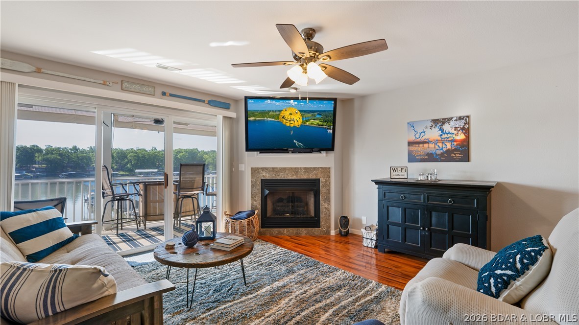 Ready to take the plunge and go all in on LAKE LIFE? Or are you looking for a solid investment rental condo?  Take a look at Westside Bay, a smaller complex that is clean and meticulously maintained.  With beautiful channel views, you can ponder the meaning of life while safely protected in a large cove, great for kayaking and paddle boarding.  A 12'x30' slip with a 12K lift right in front of the building along with a PWC slip (available separately for purchase) and lift are just steps away.  The rental ready condo offers a spacious kitchen and family room with direct access to a large screened in deck with recent updates complete with sun/privacy shades.  Three huge bedrooms will have you inviting the whole crew for weekend getaways at the lake.  This end unit is just one floor up from parking and is ready for summer, no projects or painting required! You'll rejoice in the ease of lake life from day one.  Let's make this your new happy place!  CALL YOUR REAL ESTATE PROFESSIONAL TODAY!.
