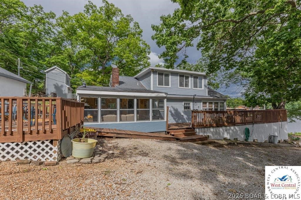 Lake of the Ozarks family oasis ready and available for you and yours to enjoy! This one-of-a-kind lake property has all that you could want...and more! The main home is 4 beds, 3 bath and has two additional sleeping areas. Plenty of room to host the entire family. As if the main home didn't have enough elbow room, this property also comes with the perfect studio guest cabin right next door. Guest cabin has its own kitchenette and full bath. Enjoy the private deck here or head back over to the main house to hang out with everyone else on the HUGE 28x45 deck. Take in the view of this quiet cove or take the gentle slope walk down to the private 2 well dock on good deep water! Additional cabin available for more $$.
