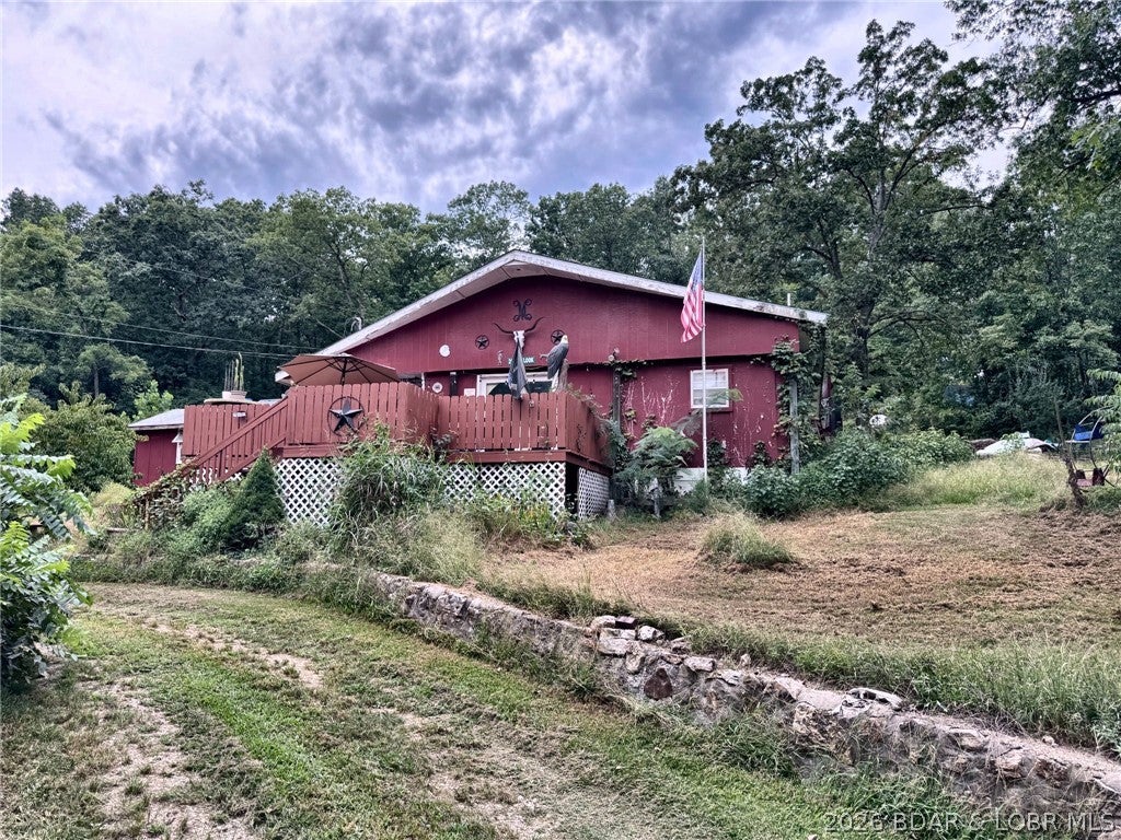 292 Outlook Dr in Edwards is priced for buyers ready to see the potential. This 2-bedroom, 2-bath home sits on approximately 0.46 acres and offers a one-level layout, deck, private well, septic and two powered outbuildings for storage, hobbies or workspace. The home could benefit from updates, but that is exactly where the opportunity begins.