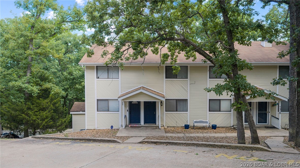 Welcome to 1318 Evergreen Ln #3, in the heart of Osage Beach, Missouri!  2 bedroom, 2.5-bath walk in unit . Take advantage of the spacious deck and lower-level walkout covered patio—perfect for grilling, entertaining, or simply soaking in the spectacular lake scenery. Just a short stroll brings you to the community dock offering a swim platform, and you'll love having your very own covered 10x30 boat slip—ready for endless days on the water. Tucked in a prime location, this unit is only minutes away from some of the Lake’s most popular restaurants, shopping, and entertainment, giving you easy access to the best Osage Beach has to offer. Priced significantly below appraisal values, and a great long term rental investment. Don’t miss your chance to own a piece of paradise—call today to schedule your private tour!