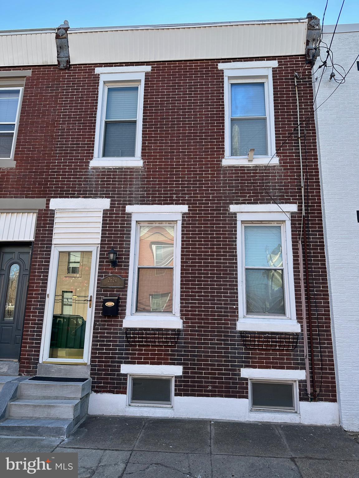 Welcome to your dream home in the highly sought-after Fishtown neighborhood! This spacious three-bedroom property offers the rare advantage of going from block to block, with a secure parking spot conveniently located behind the house. Recently updated while preserving its timeless charm, this home effortlessly blends classic character with modern comforts.

As you step inside, you'll immediately be captivated by the expansive, open-concept living and dining areas, featuring soaring ceilings and pristine hardwood floors with original inlay detailing. The large windows flood the space with natural light, creating a warm and inviting atmosphere throughout.

The generously sized eat-in kitchen is perfect for both everyday living and entertaining, featuring a breakfast bar, a large pantry, and a convenient half-bathroom. Off the kitchen, step out onto the raised deck, thoughtfully treated and stained to preserve the wood's longevity—ideal for relaxing or hosting guests.
Upstairs, you'll find three spacious bedrooms, each offering ample closet space. The additional walk-in closet adds even more storage potential, while the full bathroom provides a perfect retreat.
This home also boasts significant masonry work, including exterior pointing and a fully purged basement, ensuring durability and peace of mind for years to come.
Don't miss your opportunity to own this exceptional home in one of Philadelphia's most desirable neighborhoods. Schedule your tour today!