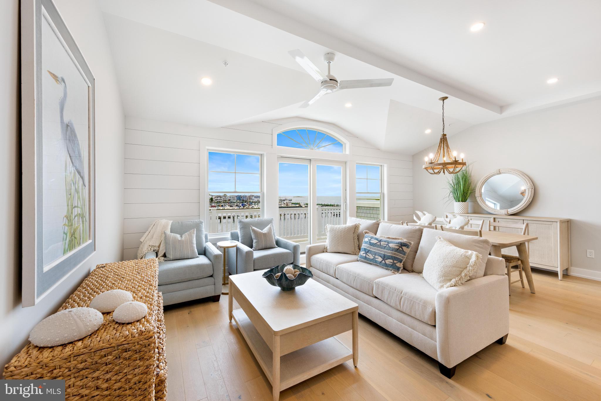 Welcome to The Buccaneer Club- LBI's newest luxury condo development featuring 20 units! A bayfront community "sitting a stone's throw from the ocean." Unit 2 is an interior unit that boasts 2 bedrooms 2.5 baths and a second family room. The interior features an open floor plan with soaring ceilings that are efficiently designed to accommodate the many roles of the family beach house.  Within the floors and walls, the structural system integrates engineered lumber and code surpassing stainless steel fasteners. Woodmode cabinetry and engineered hardwood flooring... along with quartz countertops are among the high quality products chosen for interior finishes. A 3 stop elevator, internally accessed rooftop deck, and ground level bonus room makes the home live large. This development is ideally located just two blocks to the beach and right outside of Beach Haven and all it has to offer. Sunrises and sunsets will abound from your home and the community space featuring a large heated, saltwater pool. Don't miss this opportunity! Come see these properties asap!