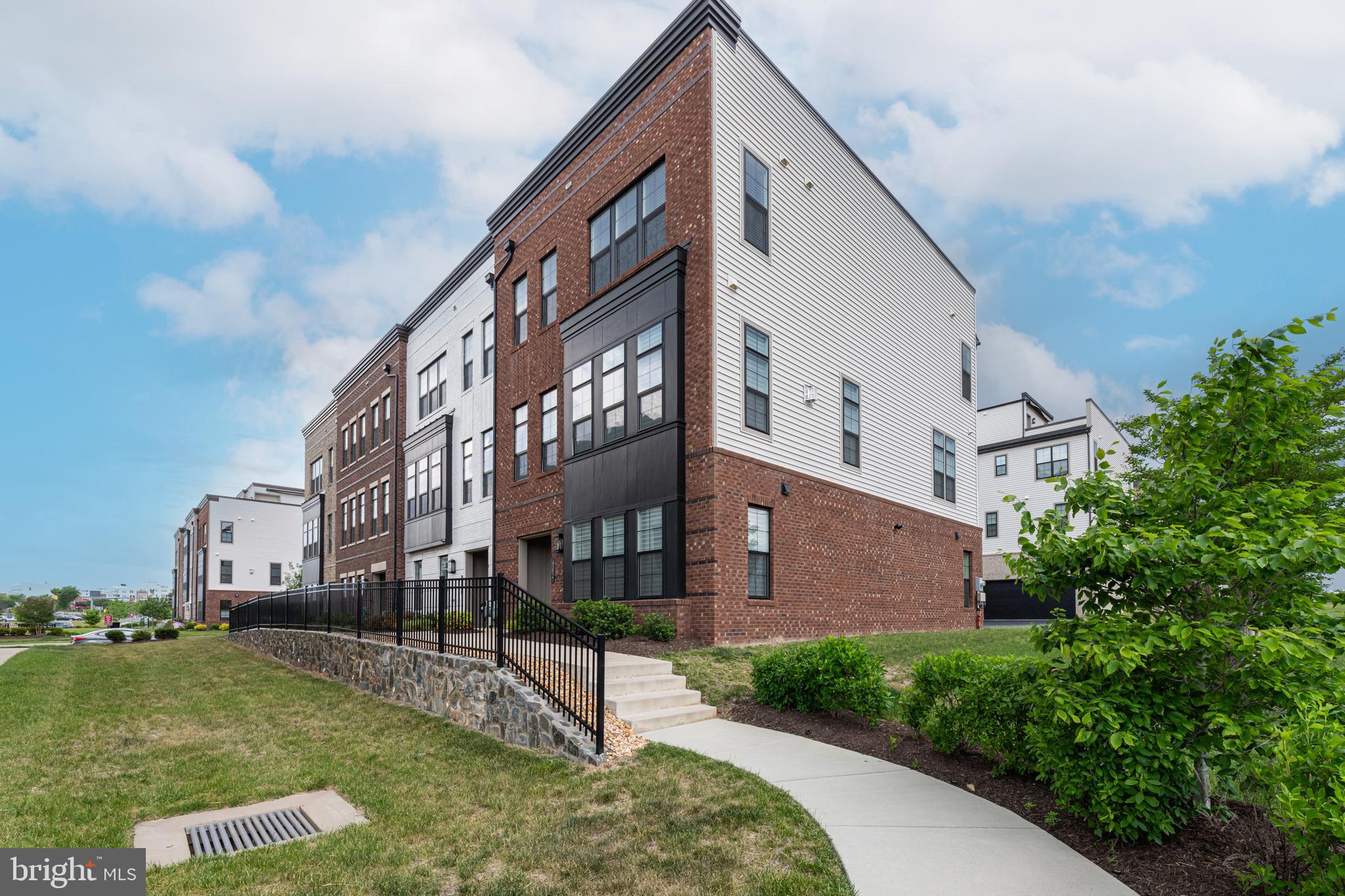 **Open House Sunday June 7th from 12:00p.m..-2:00p.m.**Simply Amazing 4-Level Elevator Townhome in Sought After Regency at Belmont -Enjoy Access to the World Class Amenities of Belmont Country Club Including Pools,  Walking Trails-Tennis and Pickle Ball Courts and Much More-Conveniently Located Adjacent to Restaurants and Whole Foods-Freshly Painted Throughout with The Finest Finishes and Designer Touches Including Wide Plank Hardwoods Throughout All 4 Levels-The Entry Level Features a Spacious Bedroom with  Full Bath and Large Walk-In Closet-The Main Level is Breathtaking with It's Wide Open Floorplan, Soaring 10 Foot Ceilings, Gas Fireplace and Endless Natural Light-The Kitchen is Anchored by a  Huge Island Floor to Ceiling Custom White Cabinetry and Incredible Stainless Steel Appliances Featuring a Five Burner Cooktop , Wall Oven and Convection Microwave-The Third Level Includes a Gorgeous Guest Suite with an Oversized Designer Full Bath and Large Walk-In Closet-The Owner's Suite is both Opulent and Functional with Abundant Windows.-Coffered Ceiling, Incredible Closet with Custom Built-Ins and a Spa-Like Owners Bath-The Forth Level Leads to an Amazing Roof Top Deck with High-End Awning, TV, Gas Line for Grill and Gas Fireplace-The Garage has Been Customized with Epoxy Floor and Built In Cabinetry and Storage-The Elevator Runs to All Levels Including the Garage-Incredibly Sexy Property in an Amazing Location Minutes from Downtown Leesburg and 15 Minutes from Dulles Airport. This is an Age Restricted 55+ Active Adult Community-Turnkey Perfection!