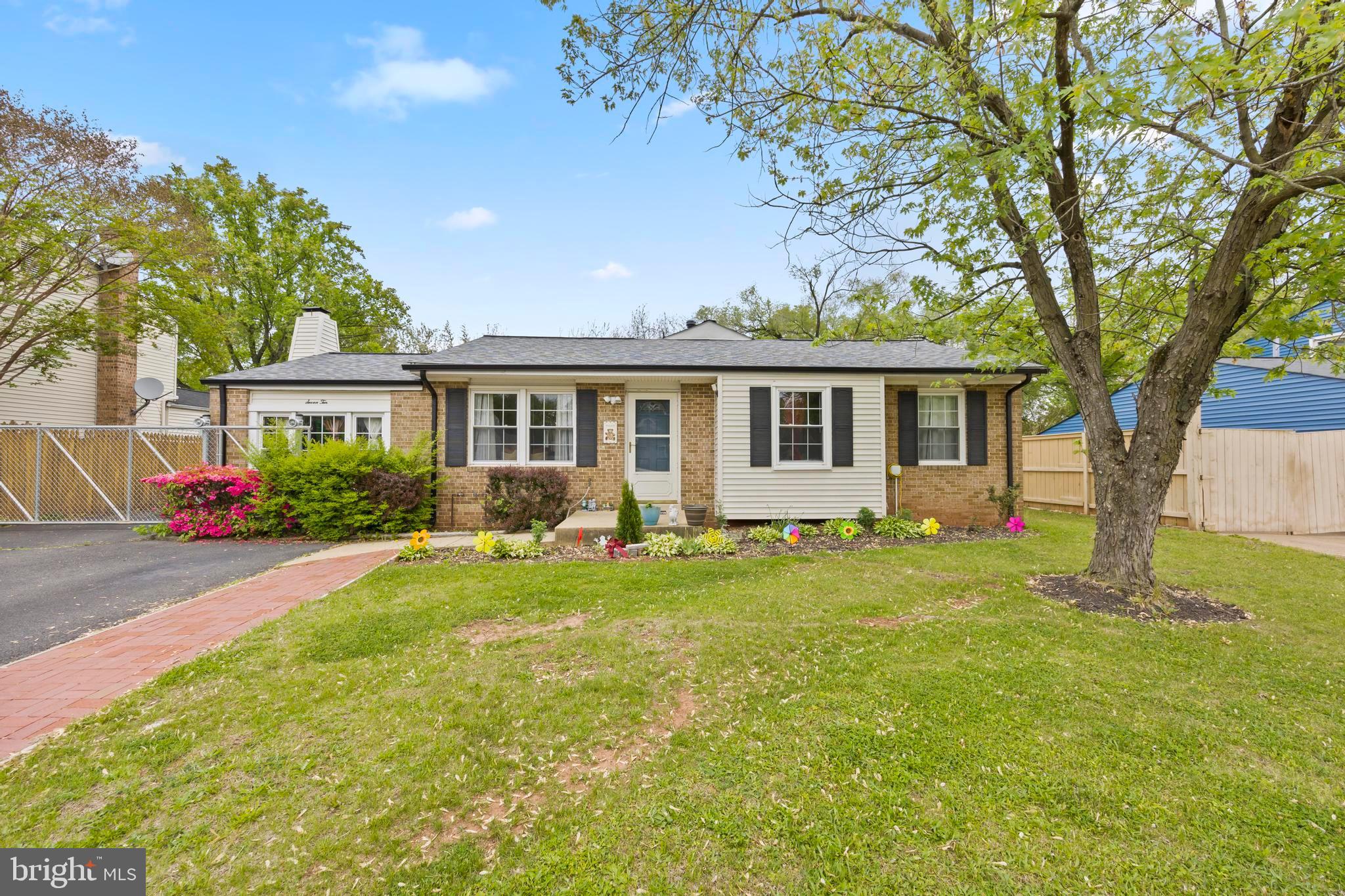 Beautifully Maintained, Expanded 3 BR, 2 Bath Rambler with extra wide 2 car garage. There is space for a total of six cars between the garage and the sidewalk. Spacious Master BR with full bath & walk-In closet. Family Room with remodeling ceramic wood burning fireplace. Sunny Kitchen w/breakfast bar opens to Dining Room. Inviting covered remodeling porch to enjoy the summer & fenced yard. Newer Harwood floor, new roof 2021, sprinklers system on the front and the entire piping system was replaced in 2018 with copper piping.