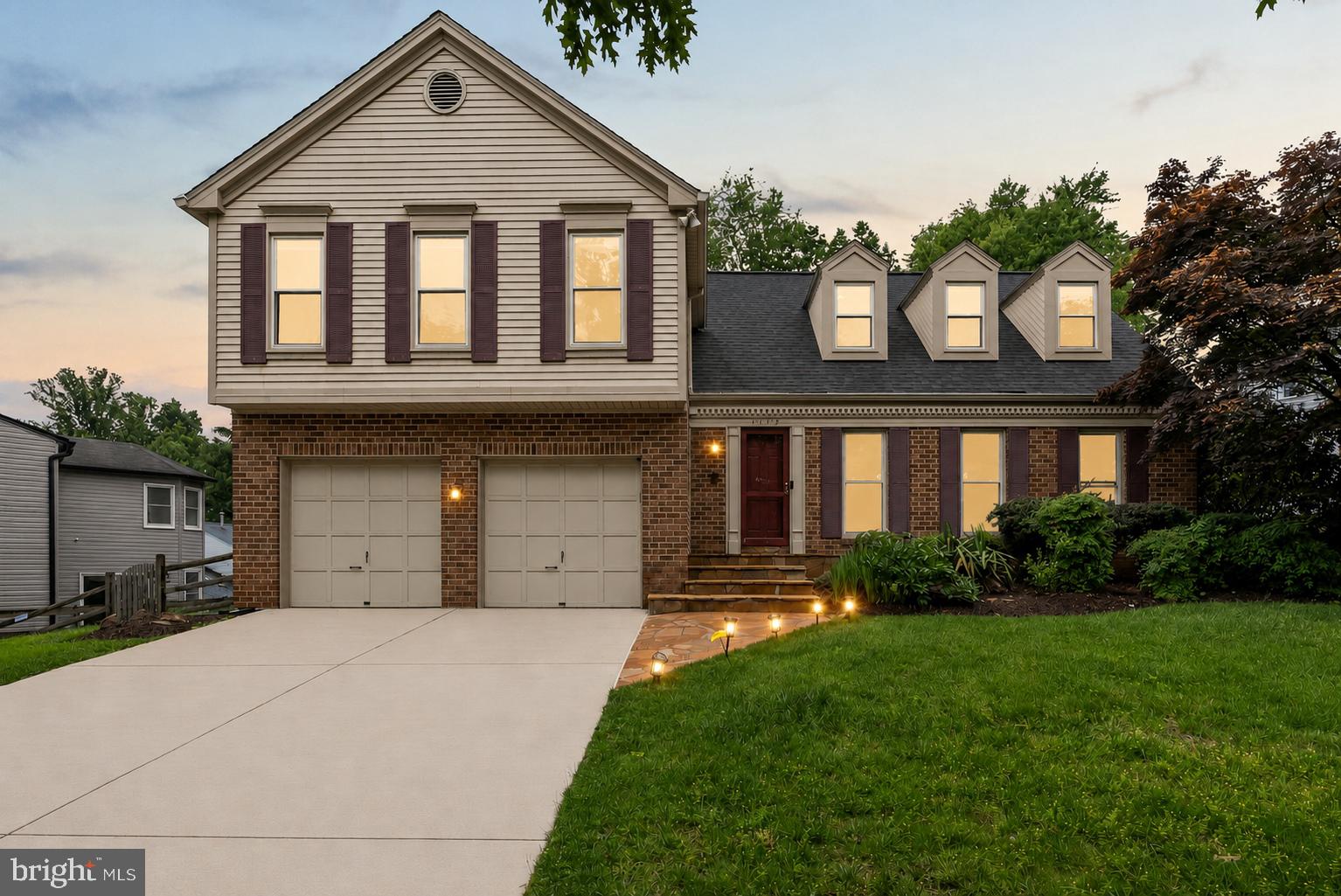Updated colonial on a beautifully landscaped lot in sought-after Orchard Ridge. This spacious home features gleaming hardwood floors throughout, crown molding, elegant formal living and dining rooms, and an inviting family room with brick fireplace and outdoor access that opens to the updated kitchen and breakfast area. The kitchen features rich cherry cabinetry, granite countertops, stainless steel appliances, gas cooking, recessed lighting, and abundant storage.

The breakfast area opens to a large rear deck overlooking a private backyard backing to mature trees — perfect for entertaining or relaxing outdoors. Upstairs, the expansive primary suite offers a sitting area, walk-in closet, and a spacious en suite bath with dual vanities, soaking tub, and separate shower. Three additional generously sized bedrooms, an additional hall bath, and a convenient upper-level washer and dryer complete the second floor.

The finished lower level features a spacious recreation room, abundant storage space, an additional bedroom, and a full bath, offering flexible living space for guests, work, or play.

Additional highlights include a convenient mudroom/drop zone off the garage, an attached two-car garage, and an expansive driveway with ample parking. Recent updates include ROOF (2018), WINDOWS (2024), and SKYLIGHTS (2025). Ideally located near Park Potomac, Rockville Pike, I-270, parks, shopping, dining, and major commuter routes, this home offers spacious living, thoughtful updates, and inviting indoor-outdoor spaces.