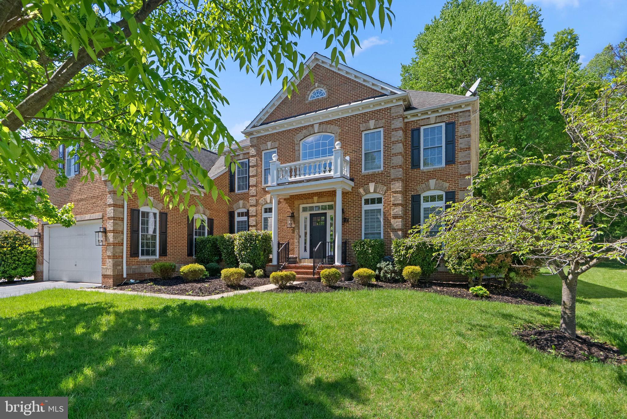 >>> OPEN HOUSE!! THIS SATURDAY, JUNE 13th from 11am to 1pm <<< Located in the prestigious gated community of Oak Creek, this elegant 4BR | 4.5BA luxury residence offers over 5,000 square feet of refined living space, plus an additional 2,600 square foot unfinished lower level ready for your vision. Offered strictly as-is, this beautifully appointed home blends timeless architecture, designer finishes, and elevated everyday living.

A grand two-story foyer with a sweeping dual staircase makes a striking first impression, opening to sophisticated formal living and dining spaces accented by rich hardwood flooring, custom millwork, stately columns, and dramatic designer lighting. The formal dining room is a standout with bold statement ceilings and curated upscale finishes.

The chef’s kitchen is designed for both style and function, featuring quartz and granite countertops, a custom ceramic backsplash, premium stainless steel appliances, double wall ovens, built-in wine refrigeration, a large center island, and a spacious walk-in pantry with custom built-ins and glass door.

The two-story family room offers soaring ceilings, oversized windows, custom millwork, and a statement fireplace, while the main level also features a private office with French doors, a dedicated laundry room with custom dog wash, and a designer wine wall that adds a sophisticated architectural touch.

Upstairs, each bedroom is generously sized with bath access, including a spacious owner’s suite with boutique-style custom closet and spa-like appeal.

Outdoor living is equally inviting with a spacious deck, custom patio, and firepit designed for entertaining and relaxation.

The expansive unfinished lower level offers endless possibilities for a future theater, gym, wine lounge, guest suite, or entertainment space.

Luxury, scale, and thoughtful design come together in one of Oak Creek’s most desirable offerings.

Recent updates include the addition of the deck and patio, quartz countertops in the kitchen, a custom closet in the owner’s suite, and a freshly painted interior. All appliances have also been updated, including a new refrigerator (2025), dishwasher (2023), oven/microwave combo (2022),  washer and dryer (2021), and the installation of a doggie shower in the laundry room.

Residents of Oak Creek enjoy access to an exceptional range of amenities, including a golf course, clubhouse with dining and event space, fitness center, tennis courts, walking trails, playgrounds, and beautifully maintained common grounds - offering a lifestyle of comfort, convenience, and recreation.

Don't miss the chance to make this home yours. Schedule your showing today!