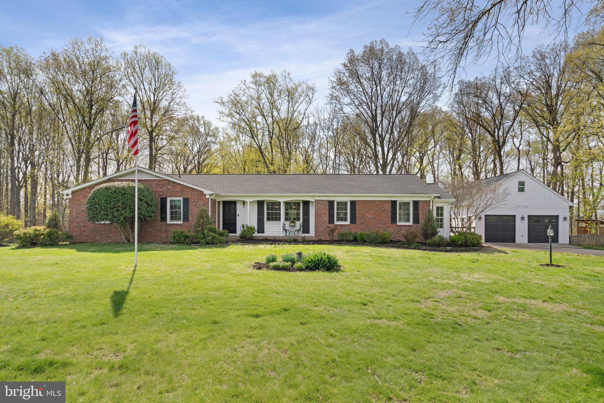 Nestled on a sprawling 3-acre lot, this exquisite ranch-style residence offers a harmonious blend of luxury and comfort, perfect for those seeking an elevated lifestyle. Meticulously maintained and upgraded, the home boasts a timeless brick exterior that exudes charm and durability. Step inside to discover a thoughtfully designed interior, featuring a seamless open floor plan that invites natural light to dance across the hardwood and luxury vinyl plank flooring. The heart of the home is the country-style kitchen, equipped with stainless steel appliances, breakfast bar, and brick accents. The upgraded countertops and ample pantry space enhance both functionality and style. The living area is a warm gathering space, highlighted by two elegant fireplaces - one wood stove in the living room and one electric in the large family room addition.  The combination dining/living area is perfect for entertaining. Retreat to the primary suite, where you'll find a luxurious upgraded bathroom featuring a rain shower, tile flooring, and shiplap accents, along with a generous walk-in closet. Three additional bedrooms provide ample space for guests or a home office, ensuring versatility for your lifestyle needs. The basement boasts a large rec room with attached bar, tons of storage, a bonus room/den, full bath with shower, and a cozy office.  The outdoor space is equally impressive, with beautifully landscaped grounds that back to serene wooded areas, offering privacy and tranquility. The large rear yard is fully fenced. Enjoy the fresh air on the screened porch or firepit on the stone patio, perfect for morning coffee or evening relaxation. The property also features a huge detached garage with additional storage space, along with a shed for all your yard care needs. Additional highlights include recessed lighting, crown moldings, multiple built-in's, and exposed beams that add character and warmth throughout the home. The laundry facilities are conveniently located on the main floor, making daily chores a breeze. With its blend of luxury features and serene surroundings, it offers a unique opportunity to enjoy both comfort and elegance in a private setting. Experience the perfect balance of indoor and outdoor living in this exceptional residence.