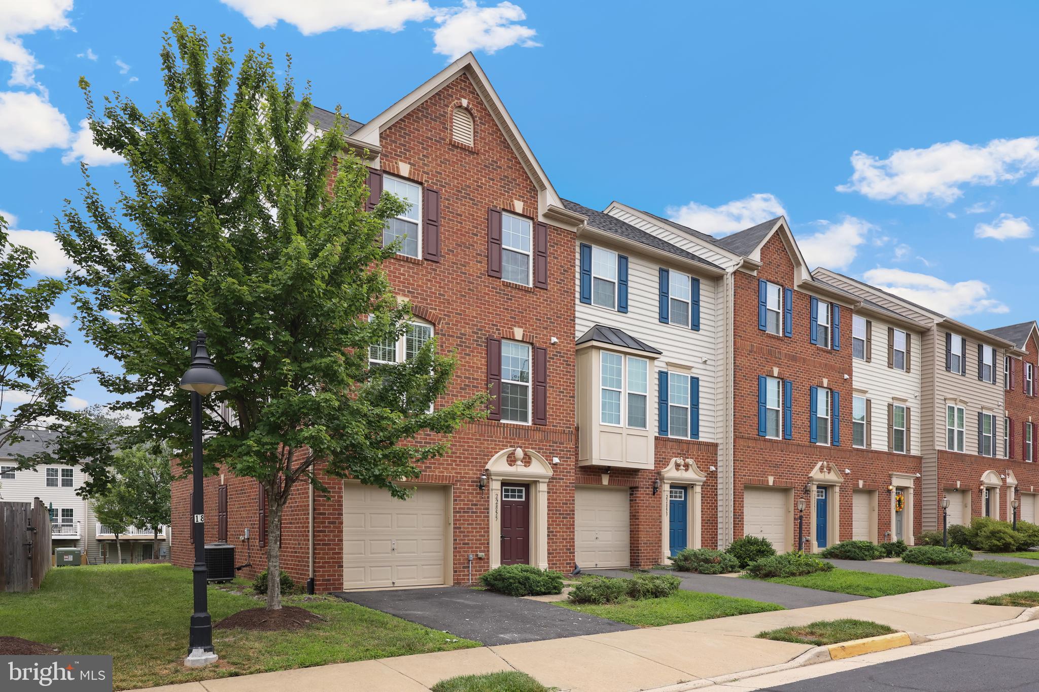 Spacious and beautifully maintained end-unit townhome offering over 2,300 sq ft of living space, 3 bedrooms, 2 full baths, 2 half baths, and a 1-car garage! The open main level features hardwood floors and a bright, airy layout, with a gourmet kitchen showcasing white cabinetry, granite countertops, stainless steel appliances, and access to a large deck—perfect for entertaining. Upstairs, the spacious primary suite offers a walk-in closet and a spa-like ensuite with dual vanities, a soaking tub, and a separate shower. Two additional bedrooms share a full hall bath, and the laundry is conveniently located on the bedroom level. The fully finished walkout lower level includes a spacious rec room, half bath, recessed lighting, and access to the backyard. Incredible location close to the W&OD Trail, downtown Herndon, Reston Town Center, the Metro Silver Line, and Dulles Airport!