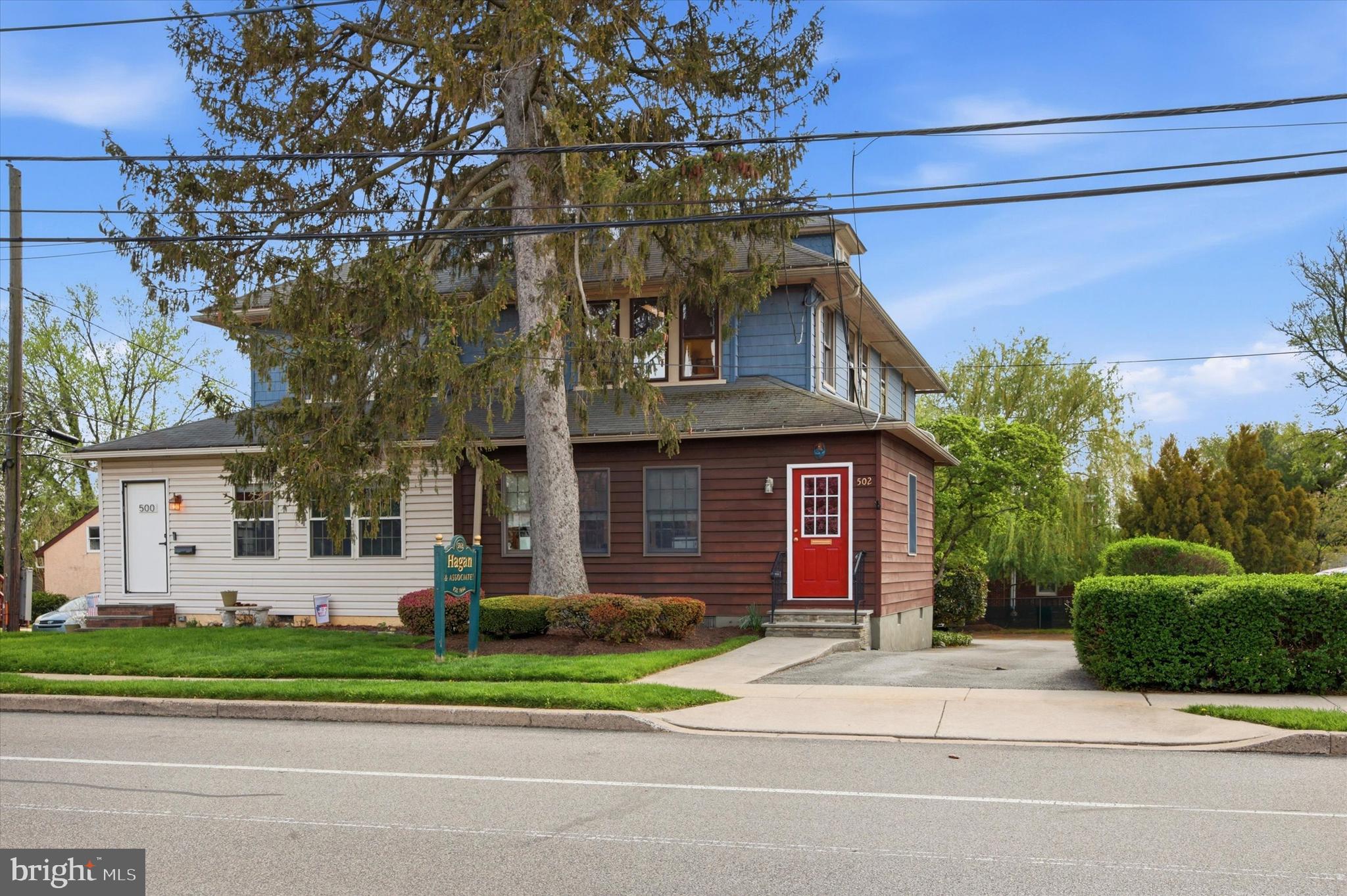This very large twin is ready for your touch. Although it has been an office for many years, it is ready to be a home again. Kitchen and baths in place. Under the office carpet is hardwood and  a partition wall in the dining room is easily removed. You enter in to the sun room/porch, fully a  4 season room with separate heat source. Up two steps to a living room with stone fireplace. Through the dining room and into the kitchen. A first floor powder room and outside entrance to the back. What was a lovely garden was paved as per the township request that the office must have parking.  Easy to change. Plenty of space in the back for entertaining and family fun. The basement is unfinished and has lots of storage space. Bilco Doors make It easy to store lawn furniture and bikes.  Great location on Darby road. walk to schools, shopping, restaurants, and transportation.  Haverford Township with its new library, festivals, playgrounds, and recreation galore is a happeinng place.  Easy commute into the city. Check it out. This is the one.