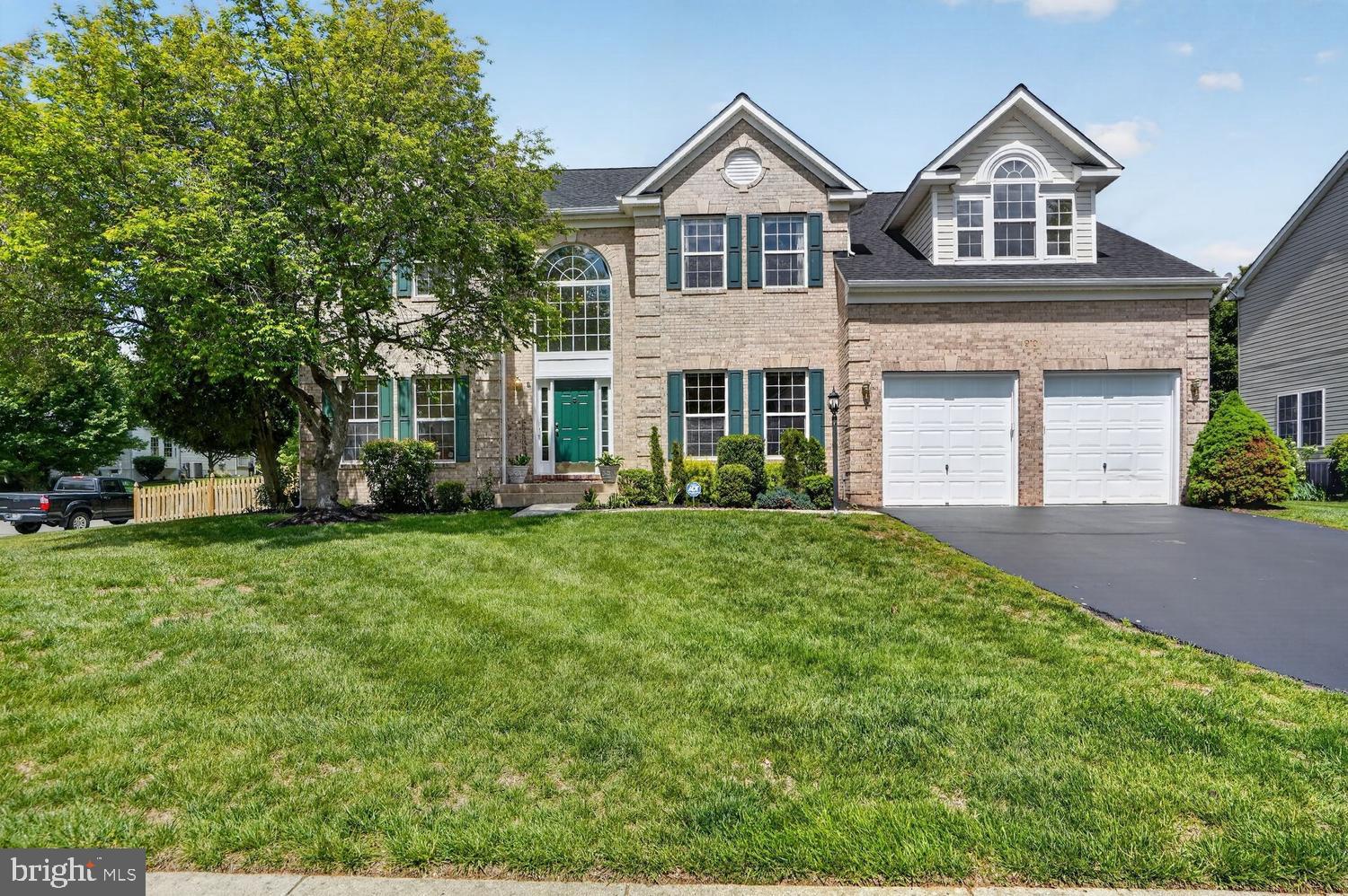 "Live Video Tours Available! Cannot view the property in person? Schedule a live, interactive walkthrough via FaceTime. Contact the listing agent directly to reserve your private virtual time slot."


Welcome to this exquisite brick-front Colonial, one of the largest single-family homes in the desirable Kinkaid Forest community,  offering approximately 5,000 square feet of finished living space,
 4 bedrooms, 4.5 bathrooms, elegant architectural details and a beautifully landscaped setting.
Meticulously maintained inside and out, the home features just-completed fresh paint, newly replaced gleaming hardwood floors on the main level, a roof replaced in 2025, and many additional updates throughout.
The impressive two-story foyer welcomes you with a curved staircase and stunning chandelier, opening to formal living and dining rooms accented with crown molding, chair railings, large windows and abundant natural light. The open and airy floor plan provides an elegant yet comfortable setting for everyday living and entertaining.
The dramatic two-story family room serves as the centerpiece of the home, featuring approximately 
24-foot ceilings, atrium-style arched windows, a cozy fireplace and beautiful natural light.  
Adjacent to the family room is a private den/library with built-in cabinetry and a large window, ideal for a home office or quiet reading space.
The gourmet kitchen offers premium finishes, upgraded appliances, and thoughtful design, including custom natural wood cabinetry, a large center island with gas cooktop, granite countertops, stainless steel appliances, double wall ovens, recessed lighting, breakfast bar, double sink, built-in desk area and a spacious walk-in pantry. 
The breakfast area opens through French doors to a large private deck overlooking the fenced and landscaped backyard.
The main level also includes a convenient powder room and laundry room.
A dual staircase leads to the upper level, featuring a luxurious owner’s suite and three spacious secondary bedrooms. The expansive primary suite offers a double-door entry, sitting area, beautifully designed windows, two walk-in closets, linen closet, and spa-style bath with dual vanities, Jacuzzi soaking tub, separate walk-in shower, and large window.
The second and third bedrooms are generously sized and share a full hall bathroom. The fourth bedroom includes its own private full bathroom and ample closet space, making it ideal for guests.
The fully finished walk-out lower level provides exceptional additional living space, including a recreation room with a cozy fireplace, a large den that may be used as a fifth bedroom, media/game room, full bathroom, exercise room, and storage room.
The exterior offers a fully fenced backyard, a large deck off the main living area, and an oversized two-car garage.
Located in the desirable Kinkaid Forest community of Leesburg, residents enjoy wonderful amenities including a swimming pool, clubhouse, tennis courts, and tot lot/playground. The home is ideally located close to Historic Downtown Leesburg, Leesburg Village, shopping, dining, entertainment, and the scenic W&OD Trail, with convenient access to Route 7, Route 15, and the Dulles Greenway.
This elegant and spacious home offers a rare combination of size, design, comfort, community amenities, and prime location in one of Leesburg’s most desirable neighborhoods.