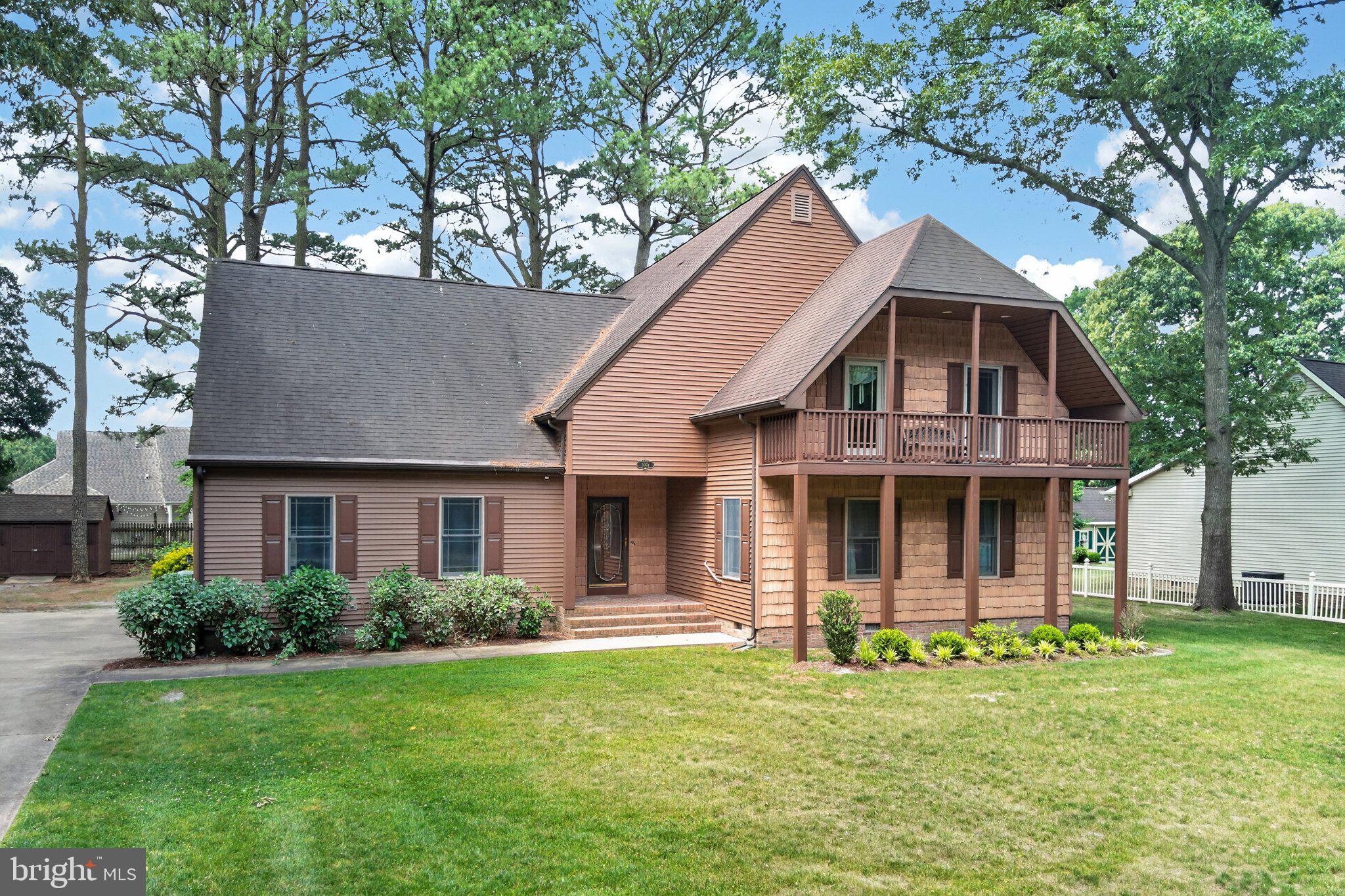 Welcome home to this beautifully updated 5-bedroom, 2.5-bath retreat overlooking the peaceful views of Schumaker Pond and Schumaker Park. Thoughtfully designed with both comfort and character in mind, this home blends timeless charm with modern convenience in all the right ways.  Step inside to fresh paint throughout every wall and ceiling, along with brand-new carpet downstairs that creates a bright, inviting feel from the moment you enter. Vaulted ceilings, a beautiful bay window, gas fireplace, and multiple walk-in closets add both warmth and functionality to the spacious layout.  The heart of the home is the kitchen, featuring durable Duraceramic flooring, quartz countertops, all-new stainless steel appliances including an induction cooktop range with downdraft vent, additional wall oven, and updated sinks and faucets that make everyday living feel elevated and effortless.  Upstairs, you'll find a massive second-floor loft offering endless possibilities for a reading lounge, media space, hobby area, or collector’s showcase. The newly finished third floor provides even more flexibility and could easily serve as a playroom, private office, guest retreat, or as a 5th bedroom. A charming barn door adds custom character to the upstairs bathroom.  Enjoy quiet mornings or relaxing evenings on the walk-out balcony with serene water and park views just beyond your front yard. Book lovers, hobbyists, and collectors alike will appreciate the abundance of versatile living space throughout the home.  Additional highlights include a two-car garage with an epoxied floor and accessibility ramp, an exterior shed with electric, and a new tankless gas boiler water heater for efficient comfort year-round.  Best of all, there are no homeowner association fees and no HOA restrictions, giving you the freedom to truly make this home your own.  Don't wait, schedule your private showing today or check out the fully 360 degree virtual tour.