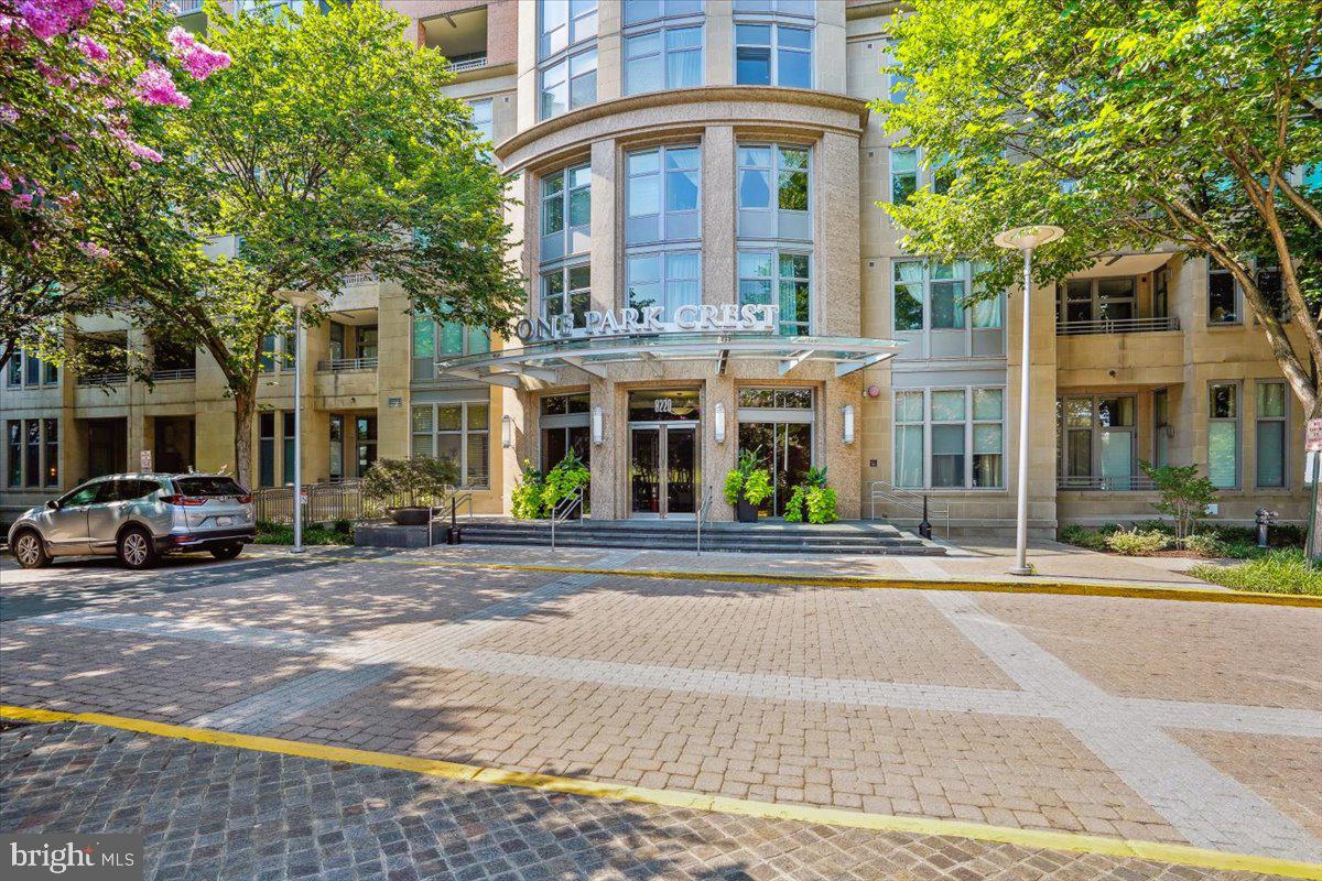 Best Value in Park Crest! Spacious and beautifully maintained 2-bedroom, 2 full bath condo on the 3rd floor of sought-after One Park Crest. Featuring an open-concept layout with well-defined dining, living, and family room areas, this home offers both flow and functionality. The gourmet kitchen is equipped with stainless steel appliances and a large center island, overlooking the expansive living and family rooms—perfect for everyday living and entertaining. Enjoy a large wraparound balcony extending from the bedrooms and living space, offering serene views of the courtyard. Brand-new HVAC provides added comfort and peace of mind. Includes two assigned garage parking spaces. Condo fee covers water, gas, and trash, enhancing convenience and value. Ideally located near shopping, dining, and major commuter routes.