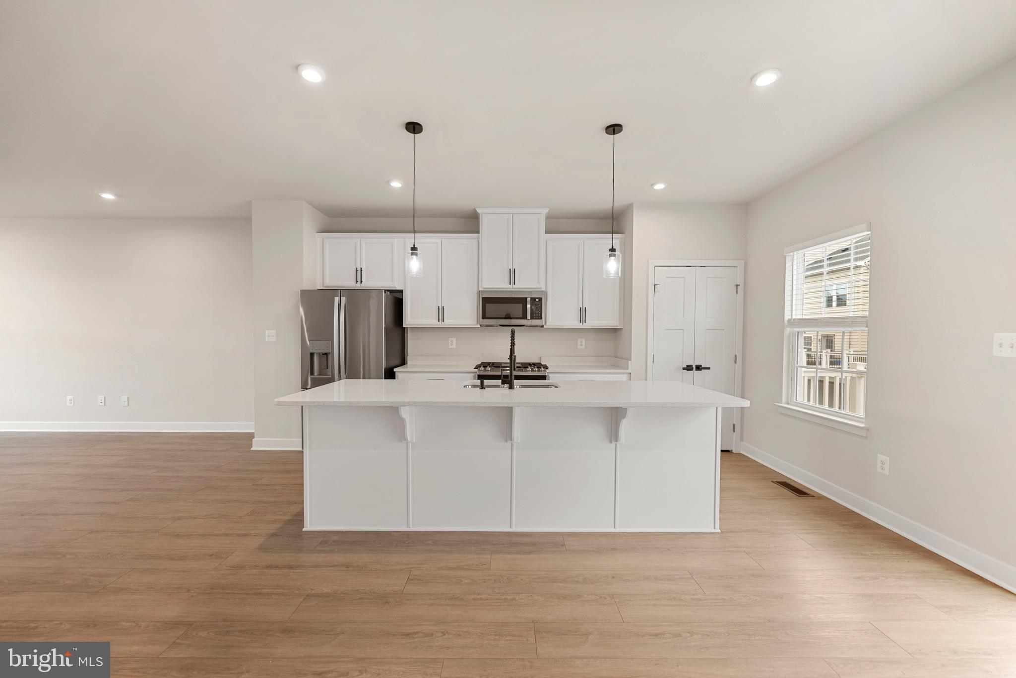 Welcome to your new home in the heart of Loudoun County! Built in 2023, this stylish brick-front townhome offers nearly 1,800 sq. ft. of modern living with 3 spacious bedrooms, 4 bathrooms, and a 2-car garage.
Step inside to an open, light-filled floor plan designed for today’s lifestyle. The gourmet kitchen flows seamlessly into the dining and living areas, creating the perfect setting for everyday living or entertaining. High-end finishes, thoughtful details, and a like-new feel make this home truly move-in ready. Upstairs, the primary suite offers a relaxing retreat, while additional bedrooms and bathroom provide plenty of space for family or guests. Enjoy low HOA fees and unbeatable convenience—minutes to shopping, dining, major commuter routes, and Dulles Airport. Zoned for Loudoun County Public Schools, this home checks every box for comfort, style, and location. Don’t miss this opportunity to own a modern townhome in one of the area’s most desirable communities!
(Co-list agent is also the property owner.)