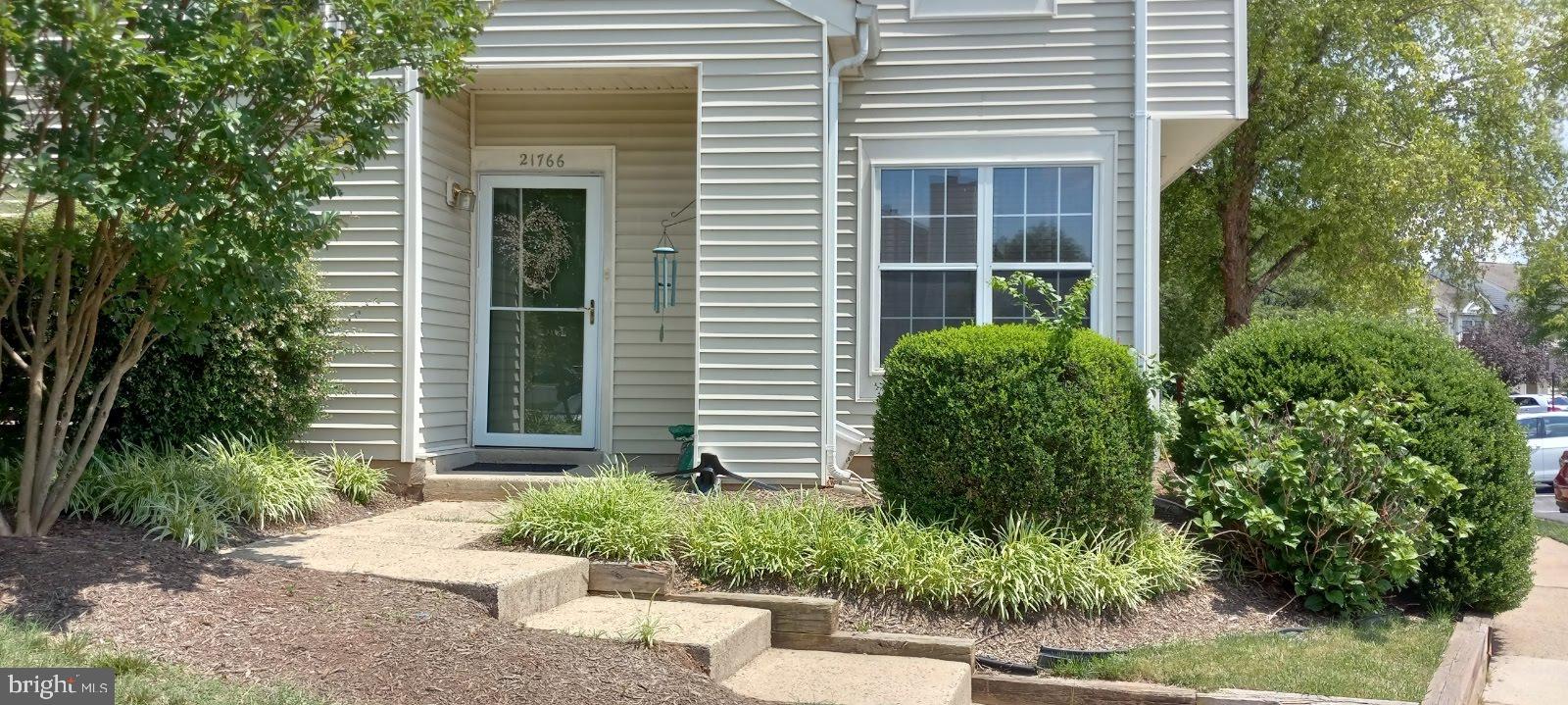 Welcome to this beautifully situated end-unit townhouse in sought-after Rolling Ridge! Featuring 3 bedrooms, a cozy country kitchen with dining space, and a walk-out to your own fenced stone patio—ideal for outdoor living. The second floor offers a spacious primary suite with full bath and walk-in closets.

Rolling Ridge is a popular neighborhood due to its easy access to routes 28 and 7, and its close proximity to the Community Plaza shopping center, trails and parks, schools, Dulles Town Center, Dulles Airport, the Loudoun Gateway Metro Station, and more.