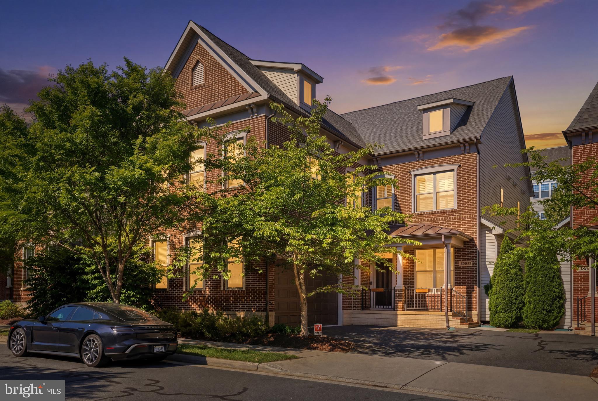 Welcome to 20623 Holyoke Drive — a beautifully upgraded residence offering over 5,500 square feet of thoughtfully designed living across three finished levels in one of Loudoun County’s most sought-after communities. With 6 bedrooms, 4.5 bathrooms, dedicated office space, a private gym, and a fully finished lower level complete with its own kitchen, this home was designed to deliver both everyday functionality and elevated living at scale — all while being moments from the unmatched lifestyle of One Loudoun.
From the moment you enter, the home makes an immediate impression with engineered hardwood flooring flowing throughout the main and upper levels, custom crown molding, and a layout that balances open-concept gathering spaces with intentional design details throughout. The main level features multiple living and entertaining areas, including a custom-built library and reading room that adds warmth, character, and versatility to the home.
The kitchen serves as the centerpiece of the main level, finished with white cabinetry, white quartz countertops, a Wolf gas cooktop, and Bosch dishwasher, all opening naturally into the home’s central living spaces. A custom mudroom built-in off the garage entrance adds both convenience and organization to everyday living.
Upstairs, the expansive primary suite offers a true retreat with hardwood flooring, separate his-and-hers closets, and a custom-built organization system within the hers closet. An added office/den upstairs creates the ideal setup for working from home, studying, or a private lounge space away from the main living areas.
The fully finished lower level significantly expands the home’s flexibility, featuring an additional bedroom and full bathroom, a dedicated gym space, and a secondary kitchen complete with gray cabinetry, black granite countertops, and full appliances — ideal for extended stays, multigenerational living, entertaining, or recreation.
One of the home’s standout features is the outdoor space — a rare offering within the neighborhood. Unlike many nearby cluster homes that back directly into neighboring properties or streets, this section of Holyoke Drive offers a true backyard experience with usable green space beyond the custom-built deck and patio, creating the perfect setting for entertaining, relaxing, or enjoying outdoor living with added privacy and openness.
Additional highlights include window shutters throughout the main level and upstairs hallways, tiled basement flooring, a Kenmore washer and dryer, and a newly replaced water heater installed in 2025.
Beyond the home itself, residents enjoy access to an exceptional amenity-rich community featuring a resort-style pool, tennis courts, playgrounds, walking trails, volleyball courts, and beautifully maintained green spaces designed for an active and connected lifestyle.
Location is everything — and this home places you just minutes from One Loudoun, one of Northern Virginia’s premier lifestyle destinations. From upscale dining and rooftop restaurants to Trader Joe’s, Lululemon, Barnes & Noble, fitness studios, coffee shops, entertainment, and year-round community events, One Loudoun offers the kind of live-work-play environment that continues to define modern Loudoun County living. The area also offers convenient access to major commuter routes, Dulles International Airport, and the expanding Silver Line corridor.
A rare combination of size, upgrades, flexibility, outdoor space, and premier location — 20623 Holyoke Drive delivers the complete lifestyle package in one of Northern Virginia’s most desirable communities.