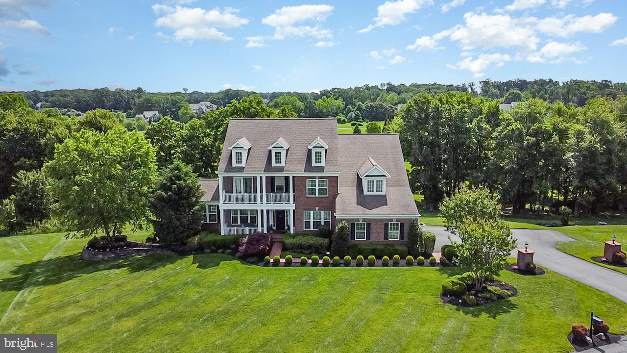 BEST VALUE IN CREIGHTON FARMS! Motivated sellers will assist with closing costs w/acceptable offer! Welcome to luxurious living in highly sought-after Huntleigh at Creighton Farms. Nestled perfectly between the exclusive Creighton Farms Club and vibrant Willowsford in upscale Loudoun County, this former Stanley Martin model home offers an expansive 6,576 finished square feet of refined space across four levels. Situated on just over three acres of beautifully usable land, the property is a private oasis framed by mature trees, custom landscaping, and open lawns. Inside, a grand two-story foyer greets you with hand-scraped hardwood floors, sophisticated formal living, and elegant dining rooms. The main level seamlessly blends elegance and everyday functionality, featuring a sun-drenched conservatory and dedicated office. At the heart of the home, the gourmet kitchen boasts an oversized center island, granite countertops, abundant cabinetry, and stainless steel appliances. It opens directly into a welcoming family room anchored by a cozy gas fireplace. Extending the living space outward, a bright rear sunroom, a large screened porch, and a spacious Trex deck provide the ultimate indoor-outdoor experience, perfect for entertaining. Ascend the stairs to discover the luxurious primary suite, a true retreat featuring a private sitting area, custom walk-in closet, and a spectacular renovated en-suite bath complete with heated floors, dual vanities, and modern LED backlit mirrors. This level also hosts three generously sized additional bedrooms—one offering a private en-suite bath and two sharing a Jack-and-Jill bath—along with a conveniently located laundry room. The fully finished fourth level presents incredible versatility, adding a fifth bedroom, a flexible living area, and a full bath, making it an ideal space for guests, an au-pair suite, or a quiet work-from-home sanctuary. The fully finished walkout lower level is an entertainer's dream. Upgraded with resilient luxury vinyl plank flooring, this expansive space includes a large recreation area, a beautifully appointed dedicated wine room, a sixth bedroom, a fitness room, a full bath, and generous storage. Step outside to enjoy direct access to a custom stone patio and welcoming firepit area. Systems and major components have been exceptionally maintained, ensuring this spectacular home is move-in ready. Complete with a three-car side-load garage and functional rear yard, the property excels in everyday convenience. Located across from the prestigious Creighton Farms Golf Club, this residence offers access to top Loudoun County schools, shopping, dining, and major commuter routes, all while being conveniently located just twenty minutes from Dulles International Airport*1yr home warranty