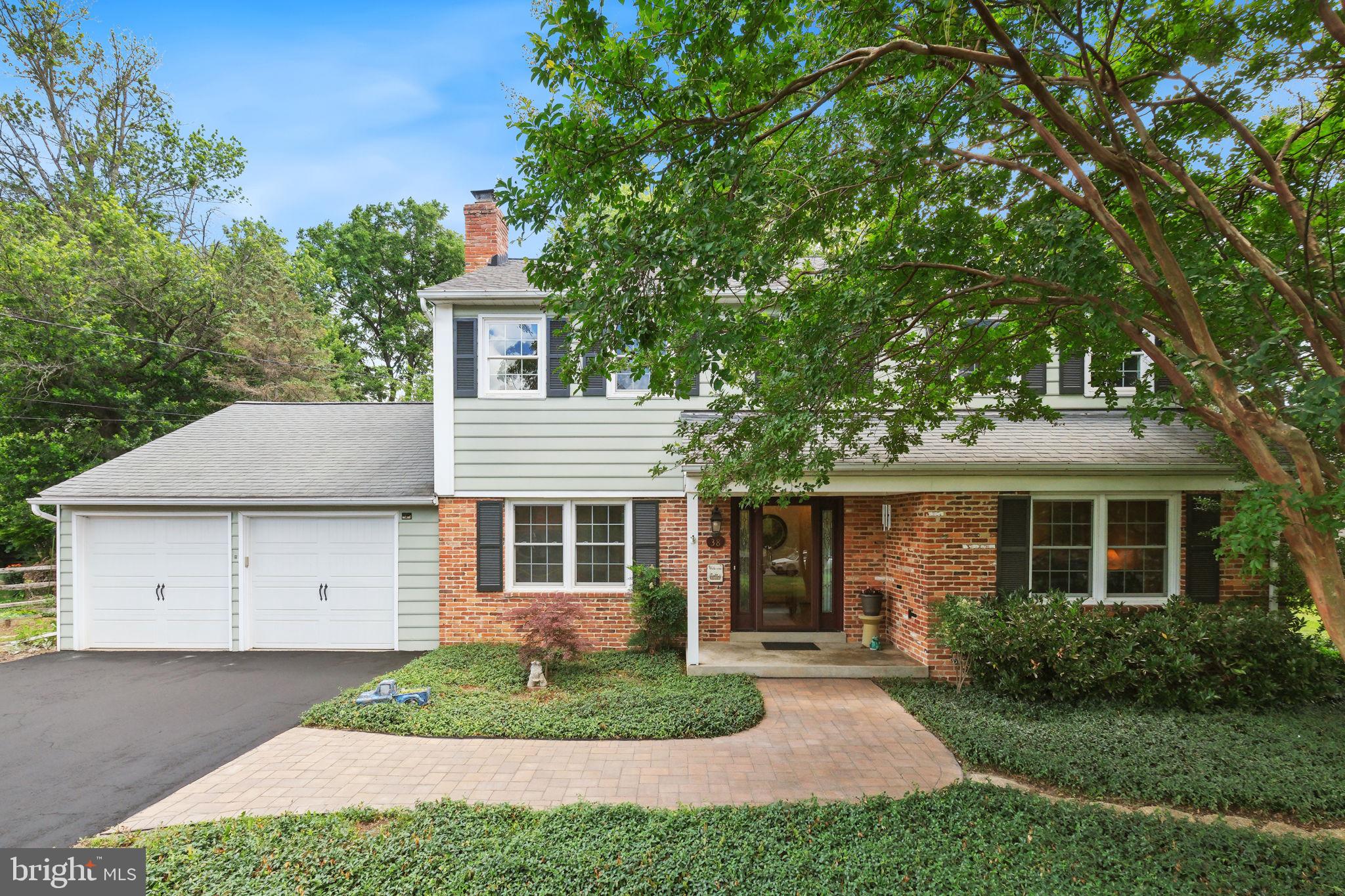 Discover 38 Orchard Way N, sited on a quiet street in the established Falls Orchard community, one of Potomac's most sought-after neighborhoods. The home offers five bedrooms, two full bathrooms, two powder rooms, three finished levels, and 3,456 total square feet. Meticulously maintained and thoughtfully updated, the home includes a new hot water heater (April 2026), new HVAC (2025), all exterior doors and the garage door replaced (2024), a kitchen remodel, updated bathrooms, a basement renovation, driveway resealed (June 2026), exterior painted (2022), a reimagined back patio and front walk, all original windows replaced with Pella double-pane windows, roof replaced (2004 with a 30-year warranty), fresh paint throughout most of the home, and more. One of the many highlights of this home is the 0.47-acre lot, allowing for a private, fully fenced backyard retreat. Boasting a large paver patio, expansive level green space, and an 8x8 storage shed, it creates an ideal setting for outdoor dining, recreation, gardening, or simply relaxing. Professional landscaping and a brick walkway welcome you to this traditional center hall Colonial defined by elegant details, including spacious rooms, white oak hardwood floors throughout the main and upper levels, crown molding, wainscoting, and abundant windows that fill the home with natural light. The renovated kitchen sits at the heart of the home. It is appointed with Silestone countertops, custom cherry cabinetry and a matching hood, recessed lighting, a breakfast bar peninsula, a travertine backsplash, a garden window, and a built-in workstation. Just off the kitchen, the family room features built-in cabinetry and an entertainment center, a brick accent wall with a wood-burning fireplace, and access to a mudroom/laundry room that exits to the oversized attached two-car garage. On the opposite side of the kitchen, the formal dining room offers floor-to-ceiling windows and a glass door opening to the patio and backyard. A formal living room, powder room, and coat closet complete the main level. The upper level offers five bedrooms, a rare find in this neighborhood, all with hardwood floors and ceiling fans. The primary suite includes double closets and an attached bathroom. The en-suite features a standalone shower, ceramic tile finishes, and can function as a Jack-and-Jill bath depending on owner preference. Four additional bedrooms, a hall bathroom with a tub-shower combination, and a large linen closet complete this level. The fully finished lower level was renovated by the current owners with resilient luxury vinyl plank flooring, recessed lighting, a rec room, powder room, closet storage, and a large utility room with additional storage space. The flexible area is perfect for use as a media room, home gym, office, guest suite, or more. Ideally located with easy access to shopping, dining, entertainment, and major commuter routes. Close to parks, recreation, and nationally rated golf courses. Served by top-rated Montgomery County schools. Don't miss this rare opportunity to own in one of the DC area's most desirable communities!