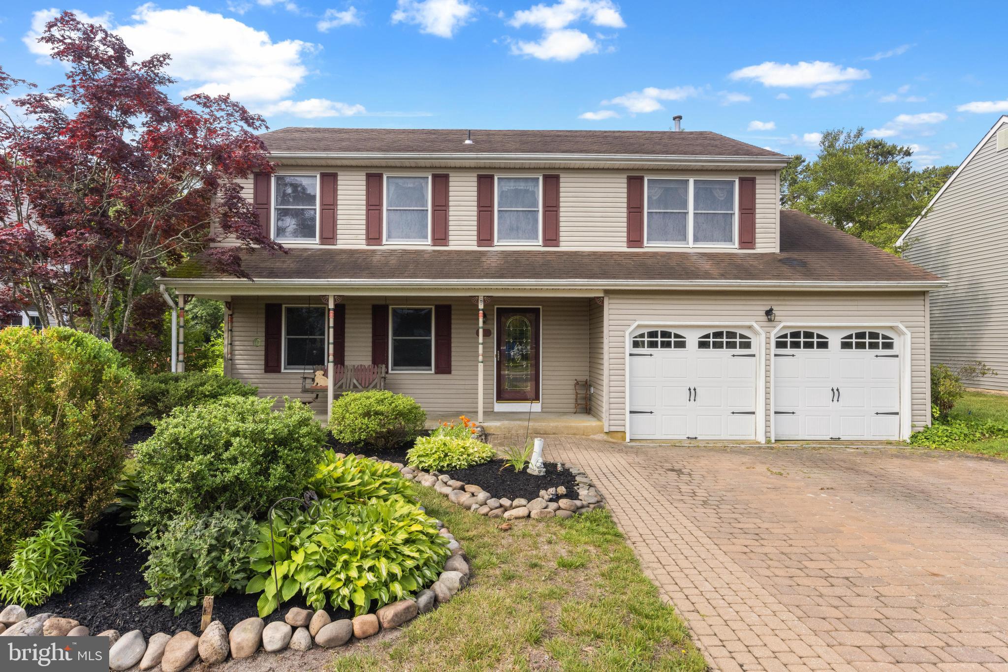 Welcome to this spacious 4 bedroom, 2.5 bathroom home offering over 2,100 square feet of comfortable living space. Situated on a private lot backing to the woods and featuring a 2 car garage, this home offers a peaceful setting in a desirable neighborhood while remaining conveniently close to local restaurants, shopping, marinas, and everyday amenities. Designed for both everyday living and functionality, the home features a spacious living room, eat in kitchen, formal dining room, dedicated laundry room, and an oversized pantry. Just beyond the main living areas, the expansive family room serves as a true focal point of the home, where vaulted ceilings, walls of windows, and abundant natural light create an inviting space to gather, entertain, or simply relax while enjoying beautiful views of the surrounding woods and nature. Upstairs, you'll find three spacious guest bedrooms along with a generous primary suite featuring a walk in closet with custom shelving. Ample attic space and storage throughout the home provide plenty of room for storage and organization. Outside, the property features a large paver driveway, covered front porch, rear deck with a retractable awning for outdoor dining and barbecues, sprinkler system, and a private backyard setting that offers the perfect place to relax and unwind. Offering space, privacy, and a convenient location, all just a short drive to Long Beach Island's beautiful beaches, this is a home you'll enjoy for years to come.