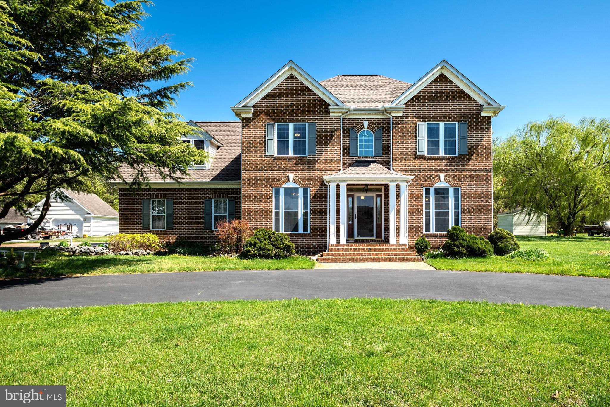 Recently updated! The first and second floor have been refreshed with brand new luxury vinyl plank (LVP) flooring and upgraded light fixtures, including modern ceiling fans, creating a stylish and inviting living space.

This stately full-brick colonial blends timeless elegance with modern comfort on a beautifully landscaped lot. Offering 4 bedrooms and 3.5 bathrooms, the home features a spacious, light-filled floor plan designed for relaxed living and effortless entertaining.

Inside, you'll find an inviting main level with formal and casual living spaces, a cozy family room with a fireplace, and a bright, functional kitchen with plenty of cabinet and counter space perfect for everyday living and gatherings.  A sunroom with a shower adds extra convenience and flexibility, making it ideal for poolside use, guests, or extended living space.  

Upstairs, the expansive primary suite offers a peaceful retreat with a tray ceiling, walk-in closet, and a spa-like bath featuring dual vanities, a soaking tub, and a separate shower. Generously sized bedrooms and a versatile loft area create flexible options for a home office, fitness room, or additional lounging space. 

Step outside to your private backyard oasis with an in-ground pool—perfect for summer gatherings. A large detached workshop/storage building with an oversized door offers endless possibilities for hobbyists, storage needs, or business owners. The circular driveway, two-car attached garage, and side driveway provide plenty of parking for guests and residents alike.

Ideally located in a quiet, established neighborhood close to shopping, dining, and commuter routes, this beautiful property offers the space, privacy, and lifestyle you've been looking for.

Come see how 6957 Amber Fields Ct feels like home from the moment you arrive!