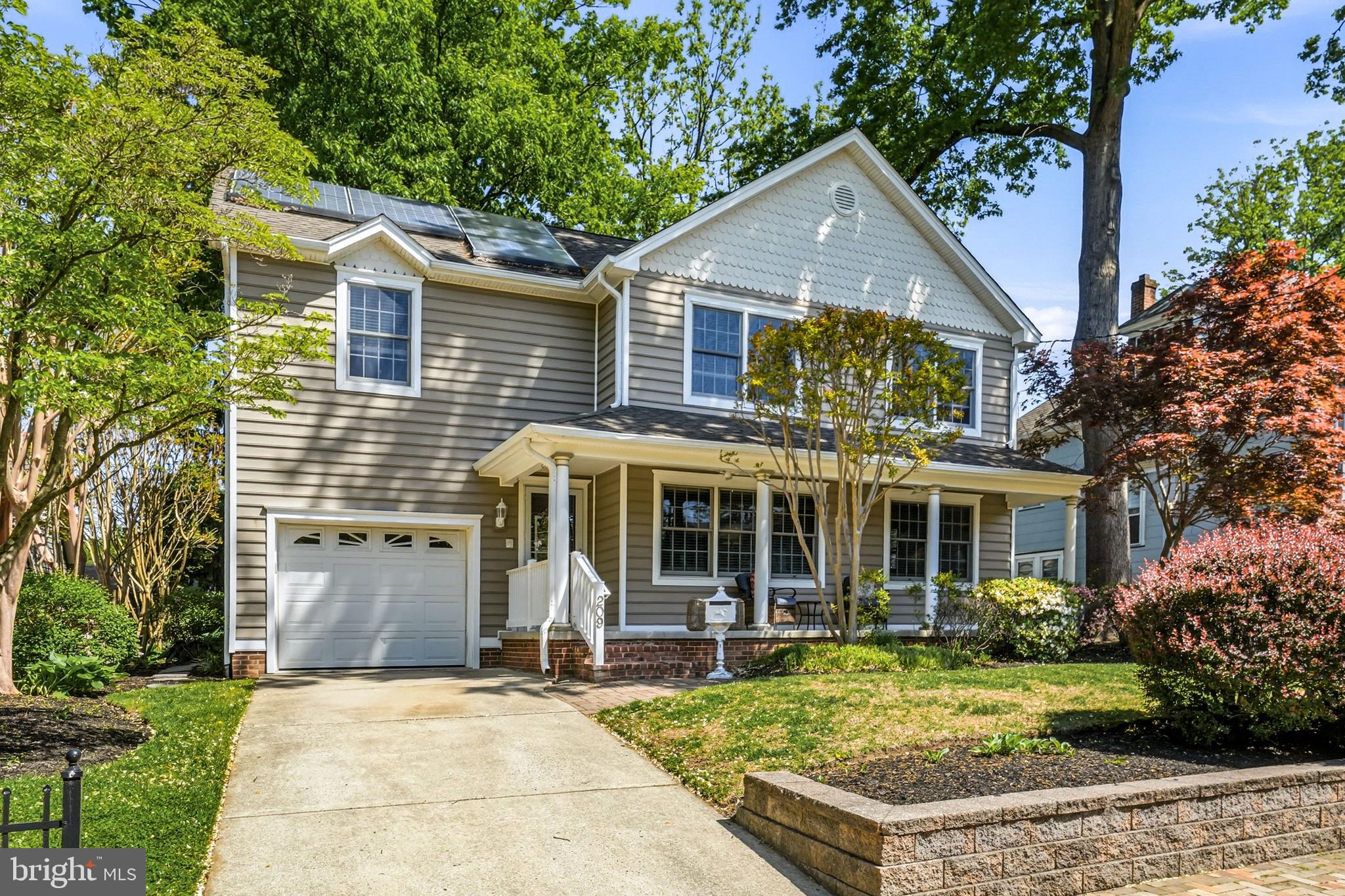 209 Lincoln Avenue is the kind of home that instantly feels welcoming from the moment you arrive. Set on a beautiful tree lined street in the heart of Haddonfield, the inviting covered front porch creates the perfect place for morning coffee, evening conversations, or simply slowing down and enjoying the neighborhood.

Inside, a gracious foyer and center hallway set the tone for the home’s thoughtful layout and timeless character. The formal living room flows seamlessly into the dining room, creating a connected space that feels both elegant and comfortable for everyday living or entertaining. From there, the home opens naturally into the kitchen and rear living spaces, where the layout becomes bright, open, and incredibly functional.

The kitchen offers stainless steel appliances, generous prep space, and an eat in area that connects directly to the family room, making this truly the heart of the home. Anchored by a gas fireplace and filled with natural light, the back of the home feels warm, relaxed, and designed for gathering. A full bathroom on the first floor adds flexibility for guests and everyday convenience.

Upstairs, the primary suite has been beautifully updated with a completely renovated bathroom that brings a fresh, luxurious feel to the space. Three additional spacious bedrooms, a full hall bath, and second floor laundry complete the upper level.

Outside, the professionally landscaped grounds continue to impress with a fully fenced backyard, rear EP Henry paver patio, sprinkler system, storage shed, and an attached garage with both front and rear access. Whether entertaining, playing, or relaxing outdoors, the backyard offers both privacy and functionality. The full basement provides endless possibilities for future finished space, a home gym, playroom, or additional storage.

All of this just moments from downtown Haddonfield, schools, PATCO, playgrounds, and everything that makes this community so special.