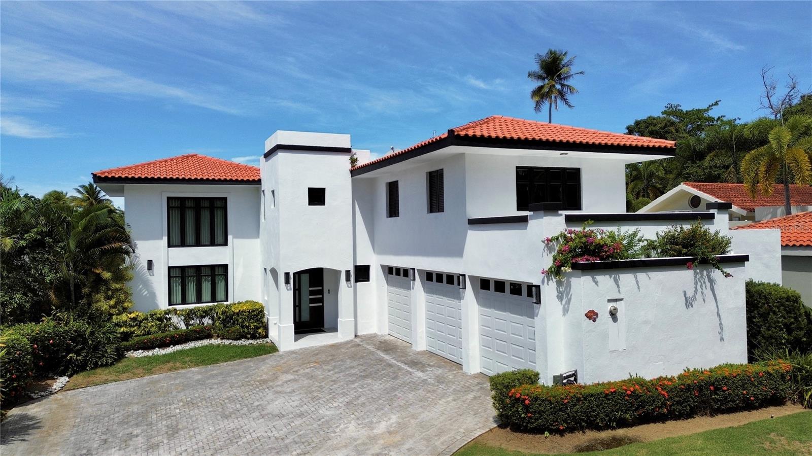Located in Dorado Beach East, one of Puerto Rico’s most sought-after residential communities, this move-in ready residence offers approximately 5,000 square feet of living space on a 926.05 sq. m. lot. Set at the end of a quiet cul-de-sac, the home offers privacy with convenient access to both Dorado Beach East gates. The Hangar, Members’ Gym, tennis and pickleball facilities, dining, and other community amenities are just minutes away by golf cart. The residence features 4 bedrooms, 6.5 bathrooms, a private full-size saltwater pool, spacious terrace with BBQ area, wine cellar, smart home technology, and a new water cistern. Furnished and well-appointed, the home offers generous living spaces and effortless access to the Dorado Beach lifestyle, including beaches, golf, tennis, pickleball, fitness, dining, and resort amenities. Seller financing and cryptocurrency welcome.