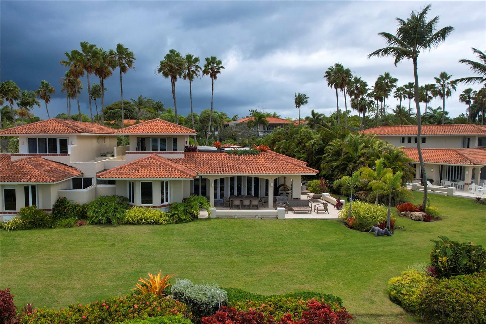 Beautiful villa for sale located in The Greens Villa within the Dorado Beach Resort. This elegant property features 4 spacious bedrooms and 4.5 bathrooms, offering comfort, privacy, and ample space for residents and guests.

The home offers approximately 4,000 square feet of interior living space, complemented by an impressive 2,100 square feet of covered terraces designed for outdoor living and entertaining. These terraces provide panoramic views of the golf course and the lake, creating a serene and picturesque setting. The property also includes a 600-square-foot garage with space for up to 4 vehicles.

This villa is professionally decorated and will be sold fully furnished, allowing the new owner to move in and immediately enjoy the refined lifestyle the community offers. The home also features central air conditioning throughout and a private jacuzzi, perfect for relaxation.

Ideally situated near to the beach, the property enjoys beautiful lake and golf course views, combining luxury, comfort, and the natural beauty of Dorado Beach Resort. This is a rare opportunity to own a stunning residence in one of Puerto Rico’s most exclusive resort communities. Available for Immediate Occupancy – $30,000 per Month.