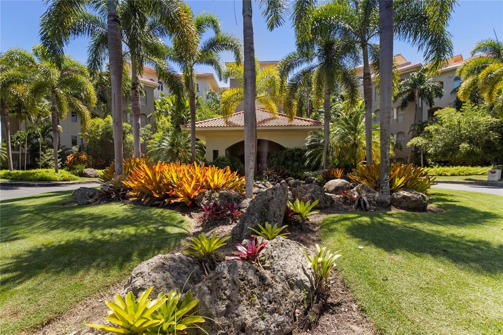 Experience luxury like no other in this stunning Plantation Village sub-penthouse within the acclaimed gates of Dorado Beach Resort and Club, in the heart of the resort. This two-story residence features a unique and highly sought-after floor plan designed for both comfort and style, with ample storage space throughout.

Overlooking the Sugar Cane Golf Course, mountains, and the new farm, the property offers breathtaking views from its two spacious balconies, perfect for lounging and entertaining.

The first floor features a spacious open-concept, high-ceiling living area, complete with an expansive, fully equipped kitchen, a bar, and a dining table that comfortably sits 8. A generously sized balcony provides additional space for dining and relaxation, seamlessly connecting the indoor and outdoor living areas to create the perfect environment for gatherings.

Upstairs, the primary and a large secondary bedroom ensure privacy and comfort, each featuring en-suite spa-like bathrooms with his and hers sinks, as well as both shower and bathtub options, offering views of the serene golf course. The two other secondary bedrooms are located on the first floor, each with its own en-suite bathroom, providing both space and convenience.

A secondary living area on the upper floor, complete with a fully equipped bar and another comfortable balcony with panoramic views, adds to the versatility of this exceptional home.

With 3,690sqft of interior space and 371sqft of covered terraces, a garage for two cars and two (2) golf cart parking spaces, and access to the world-class amenities of Dorado Beach Resort (including golf courses, fitness centers, tennis courts, and The Watermill Aquatic Park) this penthouse offers the ultimate resort lifestyle.

This property’s captivating views, luxurious design, abundant storage, and unique privacy make it an exceptional opportunity that won’t last long on the market.