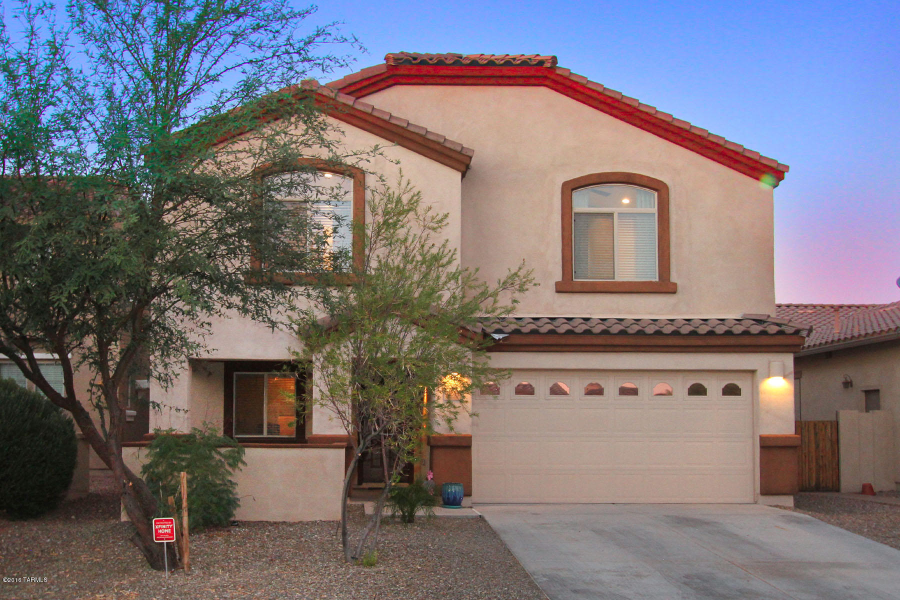 Selling will consider offers between $270k and $280k. Like NEW! You won't want to miss the ton of upgrades in this home including custom paint, tile mosaic, 45 degree tile covering all common areas, spacious kitchen with ample cherry cabinets, granite counter tops, and reverse osmosis system is open to lower level living area great for entertaining. Relax in living room on main floor with built in audio/visual system that includes drop down tv screen, surround sound, your own movie theathre!!  Great family room/loft upstairs.  Den off entry has French doors, perfect for a home office, guest room, or TV room. Fans in every room to beat summer heat and over-sized North-facing patio offers shade and doubles as upstairs deck with spectacular mountain views!