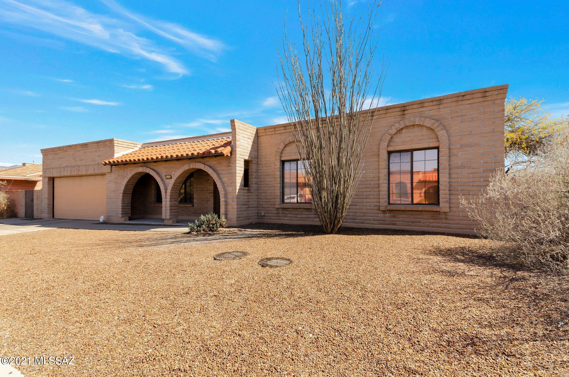 Attractive brick ranch home with mid-century charm enhanced by arched doorways, gas fireplace, and French doors to the back yard. This is a hard-to-find home scarce in this market. The rooms are spacious and include a bonus room off the kitchen with the washer and dryer closet. The master boasts a large walk in closet and double vanity in the master bathroom.  This well cared for CHIRCO home has only had one owner. The AC, roof, and engineered hardwood flooring are newer. Enjoy entertaining in the private backyard under the extended covered patio or simply relax while enjoying some peace and quiet.  Call now for your private showing and make this home your very own.