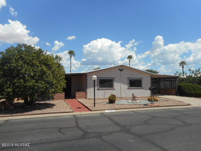 Well maintained 3 bedroom, 2 bath home. Light and bright interior. Great room with vaulted ceilings and glass slider entry to finished Arizona Room, (not included in square footage). Dining Area with hutch off Custom Kitchen with pantry & lot of cabinets. Bonus room has a utility sink, washer, dryer & plenty of cabinets. Master Bedroom has 2 closets, one with mirrored glass sliding doors, 3rd bedroom has been used as an office. Large screened porch off the carport overlooking walled in private patio for viewing sunrise & sunsets. Well sized workshop. Easy care landscaping. Hot Water Heater replaced 2018. Most windows in home replaced. Water softener & window A/C unit in AZ Rm sold As Is. HOA fee $55.00 month includes recreational center with heated pool & hot tub, ceramic, billiards, library & exercise room. Shuffleboard, horseshoes, bean bag toss, card games and bingo. Great location, close to shopping, doctors, medical.