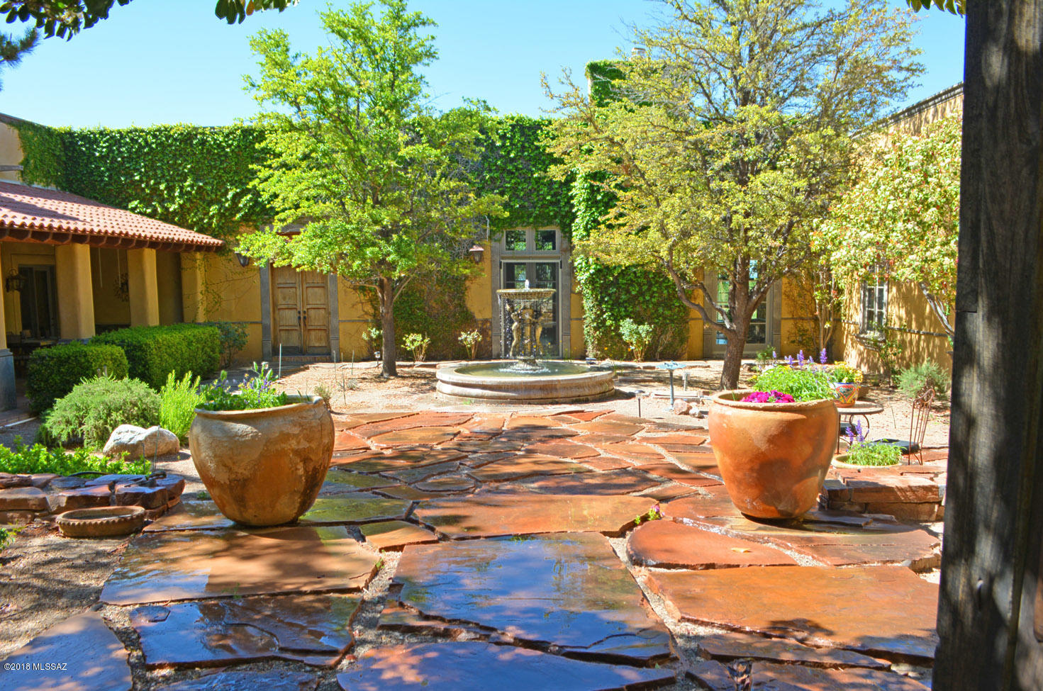 TIARA B RANCH - a serene & private  luxury retreat resting on 103 prime acres on the rolling grasslands of the historic Crown C Ranch located approx. 1hr. SE of Tucson. Features include: 4937sf 3BR/3BA main house w/charming courtyards, fountains, high ceilings, venetian plastered walls, Chef's beautifully equipped dream kitchen; heated salt water lap pool, imported wood floors, radiant heated floors in MBR, multiple impressive fireplaces; 1200sf gst house, 80X120 covered horse facility with miles of trails for endless riding/hiking, 5000sf machine shop/RV garage, tennis court, & majestic mtn views. Add near ideal year round climate for the very best of country living in the area's renowned SE AZ wine and ranch country!