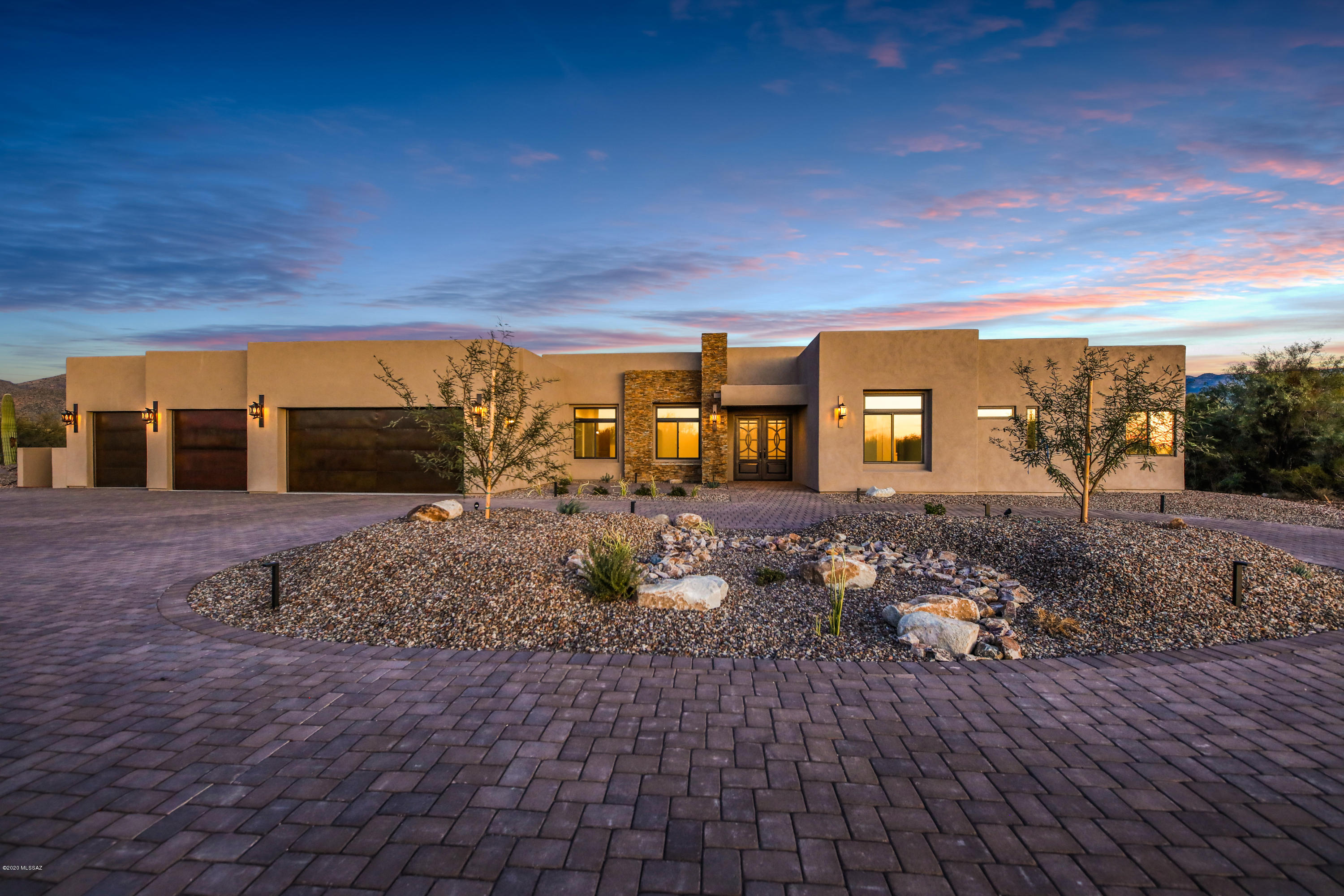 A gorgeous home on a rare 3.3 acres land subdivided into three lots with absolute beautiful views of the Catalina mountains located in the premier Foothills area. The land sits up high for an amazing 360 degrees view and fairly flat. It is a short drive to La Encantada Mall, AJ's grocery store and in the Catalina Foothills.