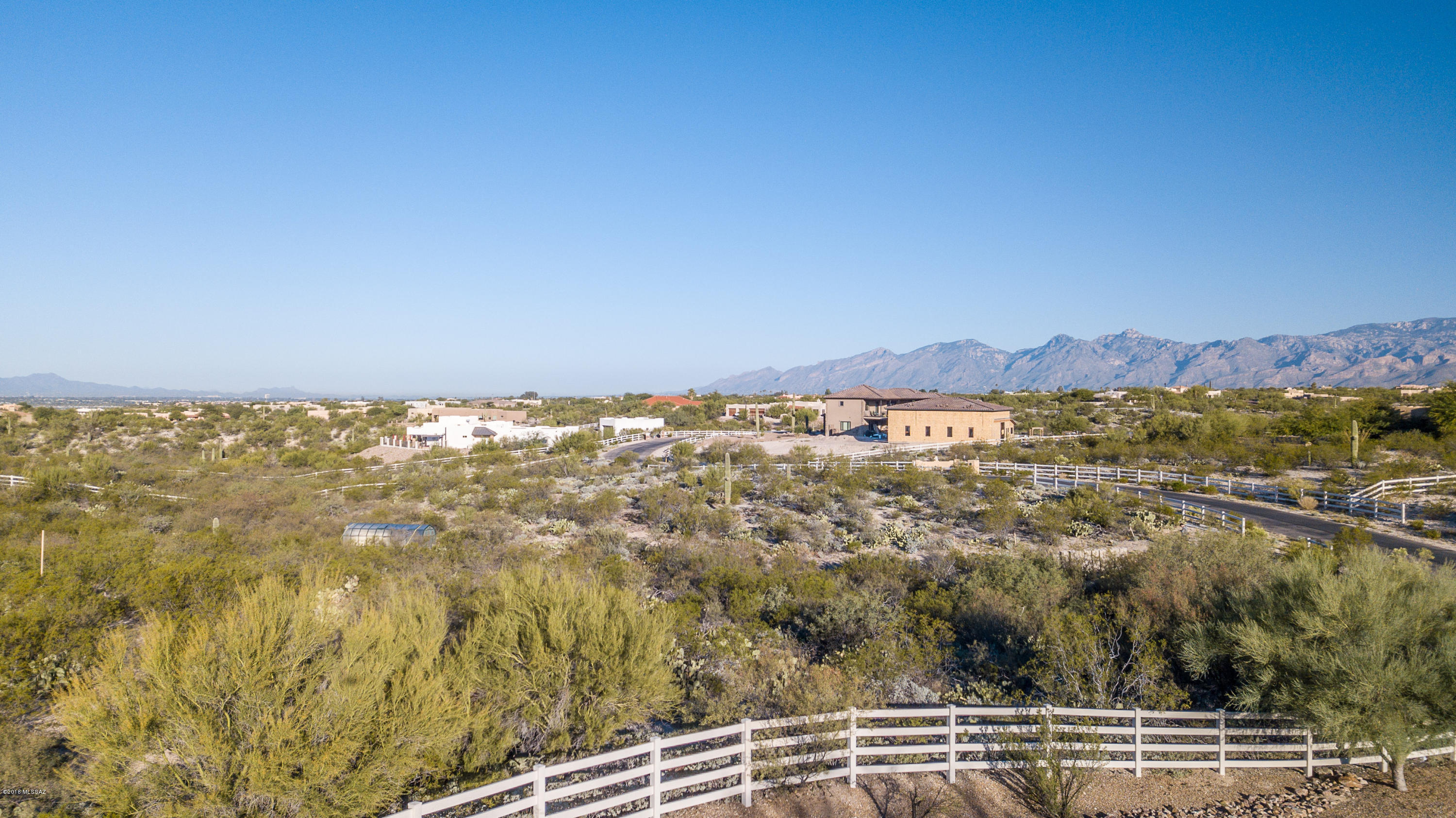 Tranquil suburban ranch 3.41-acre parcel in small gated community. Horse lovers dream lot or non-horse people looking for peace and quiet! Spectacular mountain and sunset views! Walking, Cycling or Horseback riding distance to Saguaro Monument East. Next door to the Royal Star Equestrian Center and adjacent to Saguaro National Park and endless miles of riding trails.  Desirable Tanque Verde School District.