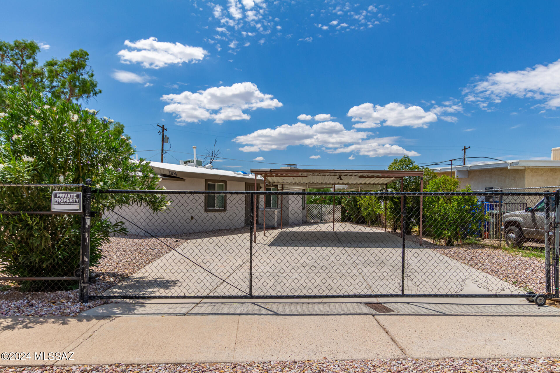 Gorgeous & tastefully updated 3-bed, 2-bath home with NO HOA! This move-in-ready gem features a remodeled kitchen and bathrooms and fresh paint throughout! The brand-new kitchen boasts a gorgeous backsplash, while the updated she-shed offers a cooled retreat. The property includes a re-rolled roof, new skylights, a covered carport, and a fenced yard with beautiful landscaping. Enjoy outdoor living on the covered patio! Located just one block from an elementary school, this home is a dream for families.