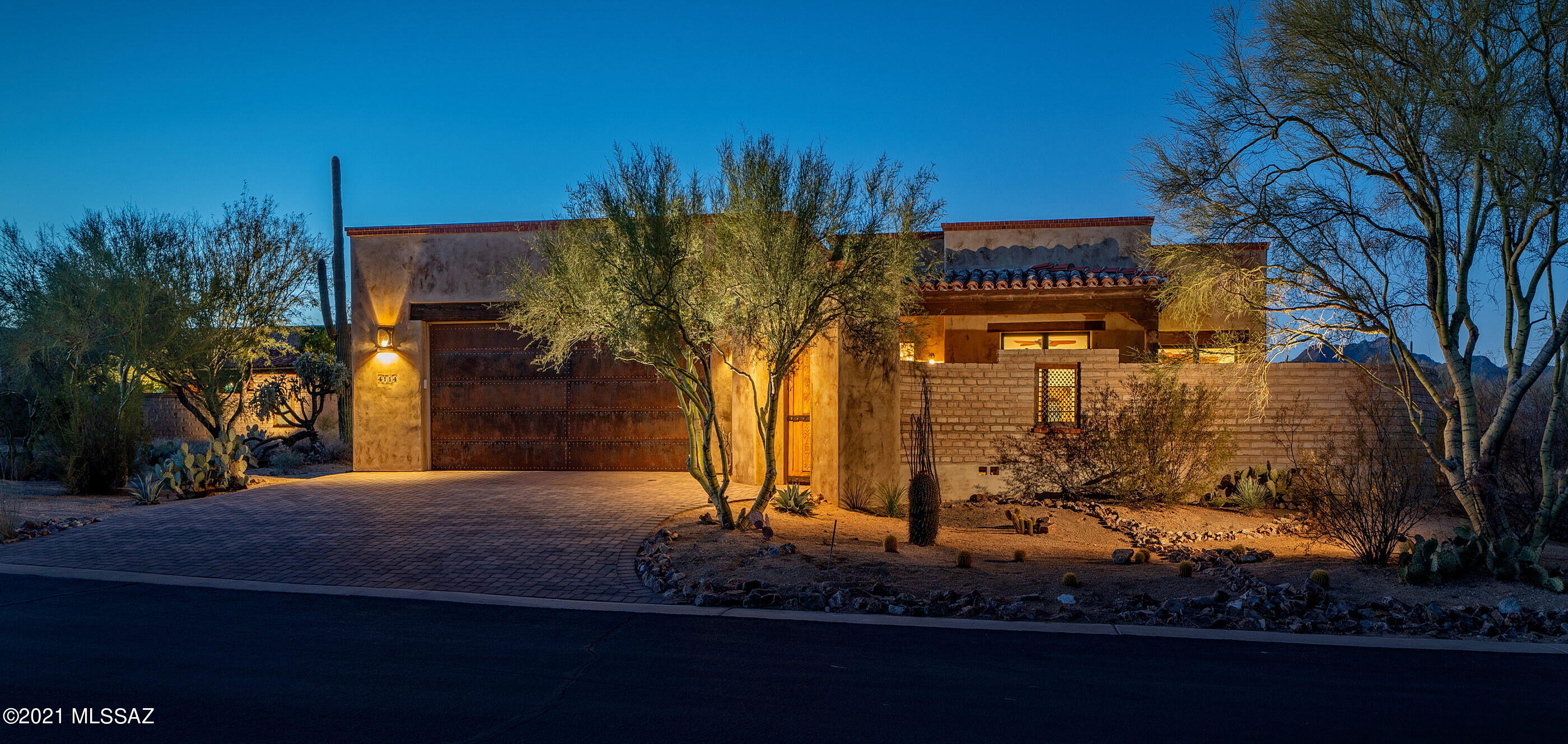 A pure expression of old world architecture, meets modern design. Displaying the stylistic hallmarks of a classic Mud Adobe,  juxaposed against a collection of clean interior design elements, creates an updated and modern interpretation of traditional desert living. A composition of architectural layers inspired by the natural surroundings, bringing honesty to the design. Beyond the home's private courtyard entry, one is greeted by a light-filled and resplendent floor plan, replete with warm vertical tones and textures complimented by exquisite custom masonry and millwork, providing both a visual and tactile experience.
