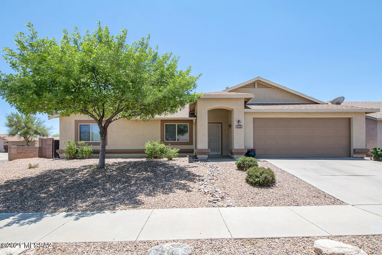 Here is a beautiful home in a wonderful eastside subdivision. Offering a great layout, large bedrooms, open kitchen design and a huge corner lot.  Enjoy the outdoors in  in your incredible yard with gorgeous landscape, huge covered patio, and gas fire pit.  Entertain all your family and friends outdoors with plenty of seating and shade around the built in BBQ.  If you have a spa in mind, the pad is poured and power available.  This is a great home with easy access to many of Tucson's amenities.  Ready for the personal touches to turn this incredible house into a home.  Call for your personal showing today!