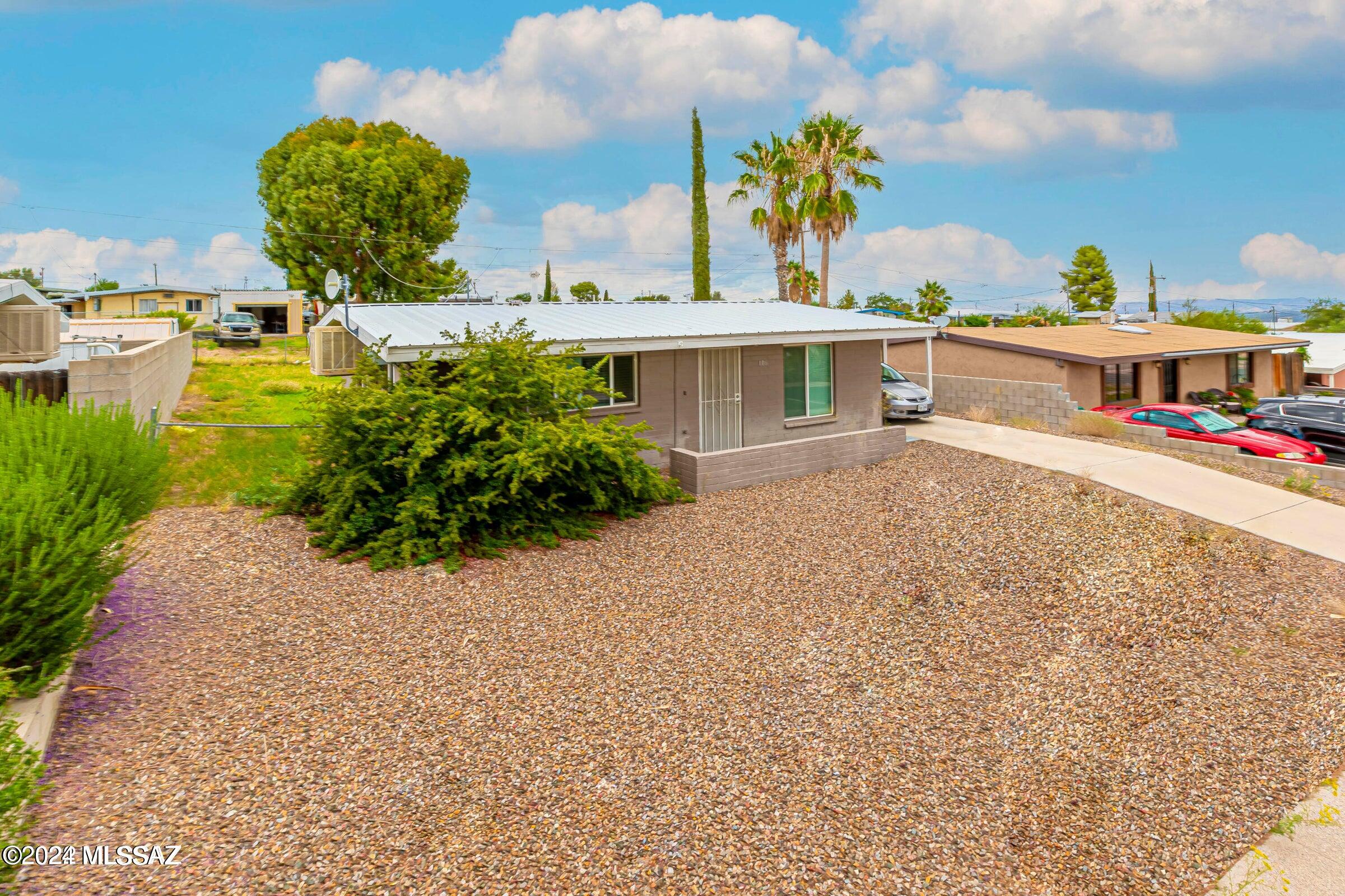Clean and updated 2-bed 1-bath home with AC and a fenced-in and private backyard! Ready for move-in mid October, after current tenants move out. The interior features a remodeled kitchen & bathroom, central air conditioning, tile flooring & new sheet vinyl in bedrooms, and appliances included (stainless steel side-by-side refrigerator, dishwasher, gas cook stove). The exterior features a fenced-in backyard with block walls for privacy, covered laundry hook-ups on porch, and an extra storage shed. Please contact property manager for application / deposit info and to schedule a showing.