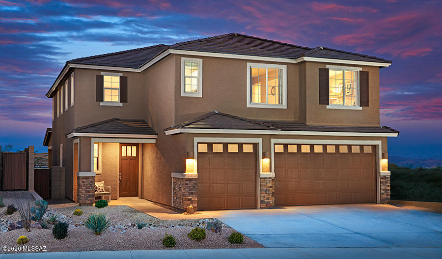 A charming covered porch and airy, two-story entry greet guests as they enter this former model home. The main floor offers an inviting, open layout with a dining room flanked by a great room and a kitchen with a center island and quartz countertops. A study with built-in shelves and a convenient mudroom are a few steps away. The luxurious master suite, complete with an immense walk-in closet and a private bath with a walk-in shower awaits upstairs, as well as a spacious loft, a laundry and three additional bedrooms. Also includes a morning room, a fireplace and a 3-car garage! Fully landscaped front and backyard with no neighbor on one side with open arroyo next to and behind home. In addition to home sales price, furnishings and artwork, with exception of beds,to be sold for $6,000.00.