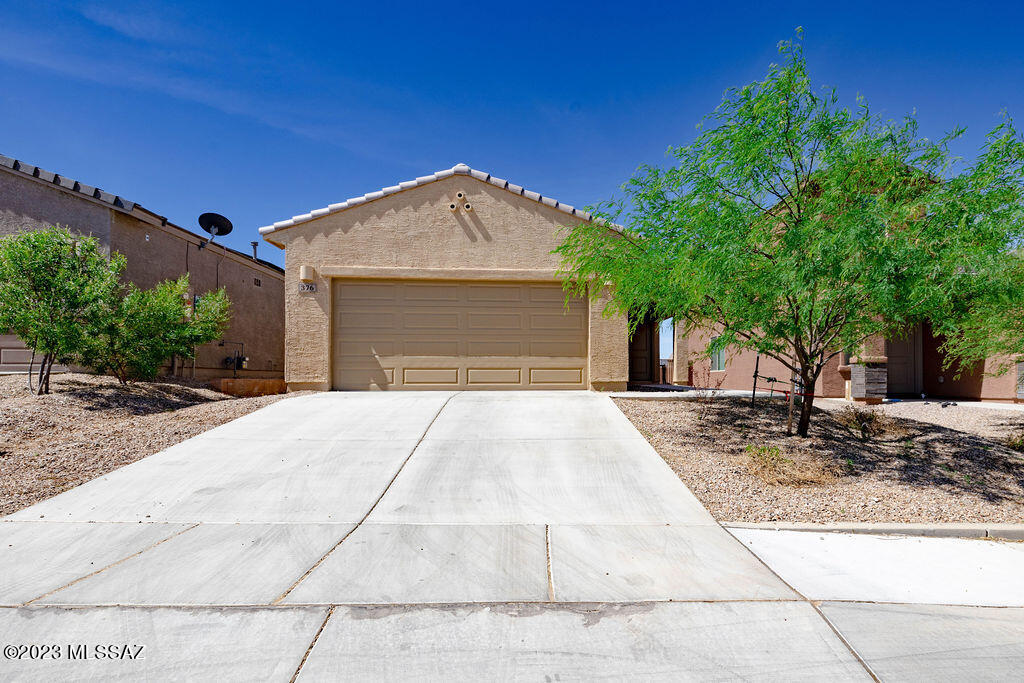 Welcome Home! This move-in ready home features 3 bedrooms, 2 full bath + den/office, landscaped back yard with turf & pavers, 2'' faux wood blinds on all windows, ceiling fans in every room, and no neighbors behind. The den can easily be converted into a 4th bedroom as it already contains a closet and a window. The large kitchen is a dream, with plenty of room to move around and prepare meals with plenty of storage and counter space. Adjacent to the kitchen is a convenient laundry room. The primary bedroom is located at the back of the home giving the home a split floor plan.