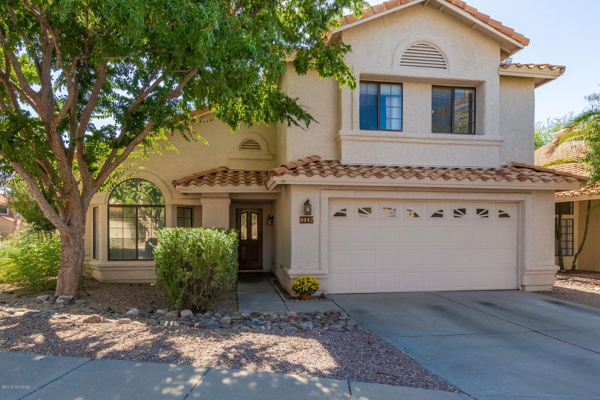 Lovely updated home on large corner lot in desirable Lakes of Castle Rock HOA Association. Spacious living room, dining room combination with vaulted beam ceiling.  Large kitchen with updated maple cabinets, granite countertops, convection oven, wine fridge, peninsula, eating area, and pantry closet. Open floor plan to the huge family room and access to the covered outside patio. Lush, private, shaded backyard with mature trees.  The home has 5 bedrooms, one downstairs (with an adjacent half bath), 4 bedrooms upstairs includes a huge master suite.  Both upstars full bathrooms were very recently and lovingly renovated. Master bath feels like a spa with designer tiles, free-standing soak-in tub, and spacious glass-enclosed shower along with a double sink vanity with granite countertops Backyard landscaping includes Chilean mesquite (no pods or thorns), almond,  kumquat, and tangelo (the fruits are yummy and the citrus flowers smell amazing) among other trees.  Huge edge of oleanders provides lots of privacy and color (red and white flowers.) The HOA maintains elegant and manicured common areas as you drive through to get home including 14 lakes, lots of paths around the neighborhood, a vast wash with lots of wild life (hawks, ducks, and egrets among others), and amazing amenities:  community center, 2 pools and spas (one is heated in the winter), tennis court, basketball court, kids play area, and a substantial gym open to residents only.  Walk to shopping and restaurants nearby