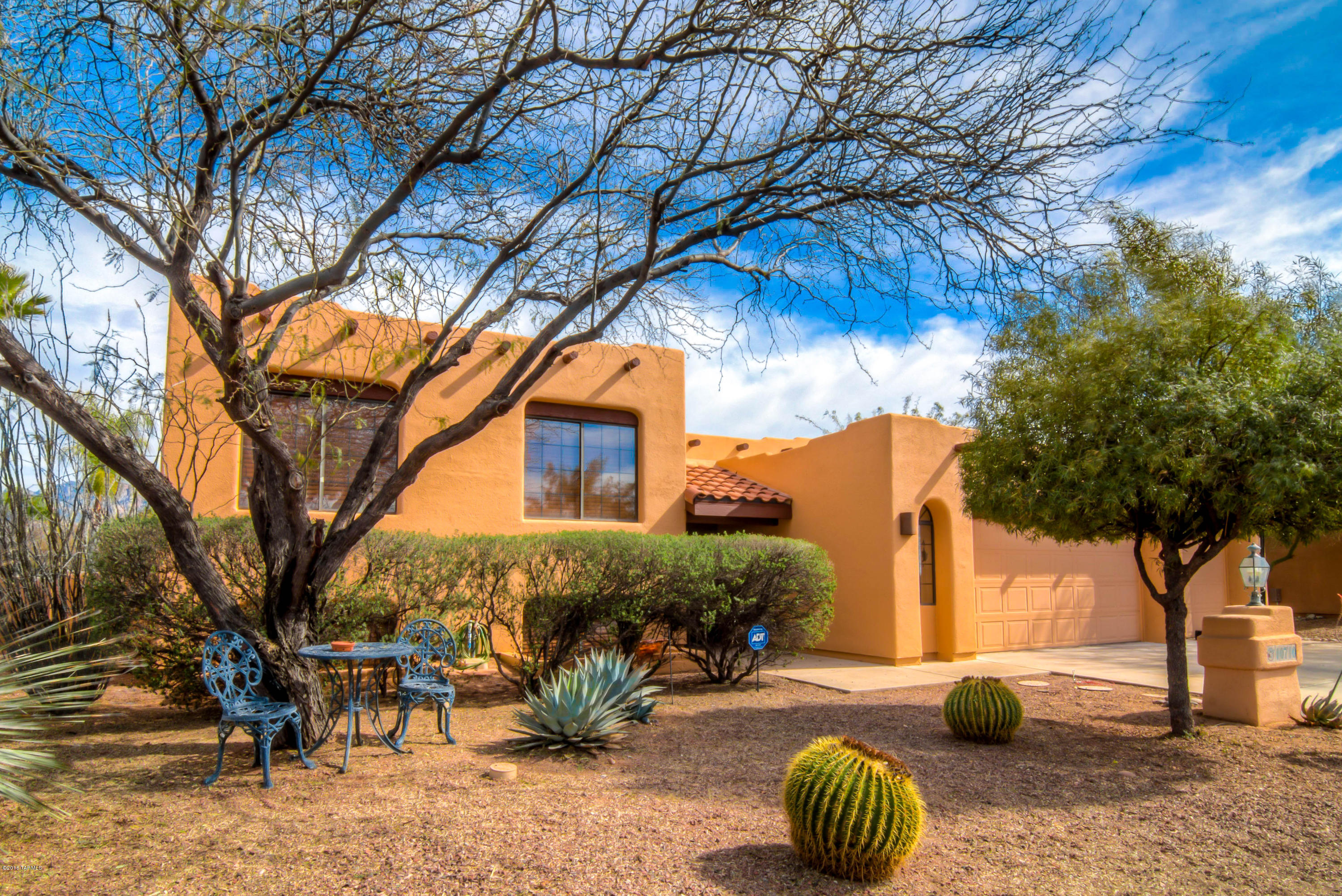 Amazing Golf Course living, in the heart of Oro Valley's Canada Hills! Come see this 5 Bedroom, Contemporary, yet Santa Fe style home with subterranean rooms and entertainment areas. Fresh paint, newly refinished Saltillo tile, coated concrete, maticulously maintained home in the Wilson / Ironwood ridge school district, make this home one that will not last the Spring. Large rear yard backs on to the tenth tee of the El Conquistador Country Club golf course. A sparkling Pebble-Tek pool and spa, faces East to take advantage of mountain and city views. Quite simply, this home is priced to sell...TODAY! Come see why!