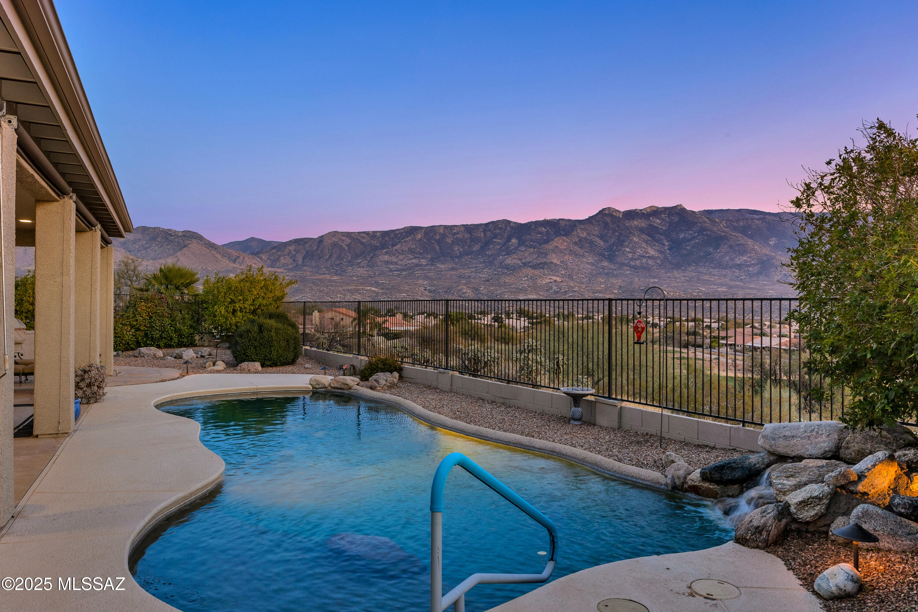 Breathtaking views of Catalina mountains overlooking the 9th Hole of the Mountainview Golf Course makes this Sundance model a must see!  This property offers unparalleled comfort, thoughtful upgrades, and a lifestyle that feels like a permanent vacation. The kitchen is a chef's dream updated with black stainless-steel appliances, including a Bosch dishwasher, GE Advantium oven, gas cooktop, Elkay Quartz Luxe kitchen sink, and natural granite countertops. A water filtration system ensures pristine hydration. The Casita, complete with a Murphy bed and full bath, is perfect for visitors or multi-generational living.  A Jack & Jill bathroom adds functionality and privacy for additional bedrooms upstairs. Primary suite includes: Blackout blinds, walk out to patio, and serene views. There's also an extended 3-car garage with insulated garage doors and a stainless-steel sink. Outside there's a built-in BBQ with gas hookup, flagstone patio with sunshades, ceiling fan, and a conventional pool for year-round enjoyment.  Other upgrades: New water heater (2024), energy-efficient window screens, and epoxy flooring in the garage and driveway, recently painted exterior, new security screen patio doors, recently replaced Irrigation System in front yard.  This meticulously maintained home combines style, functionality, and unbeatable scenery. Don't miss your chance to own a piece of paradise in Saddlebrooke. Schedule your private tour today!