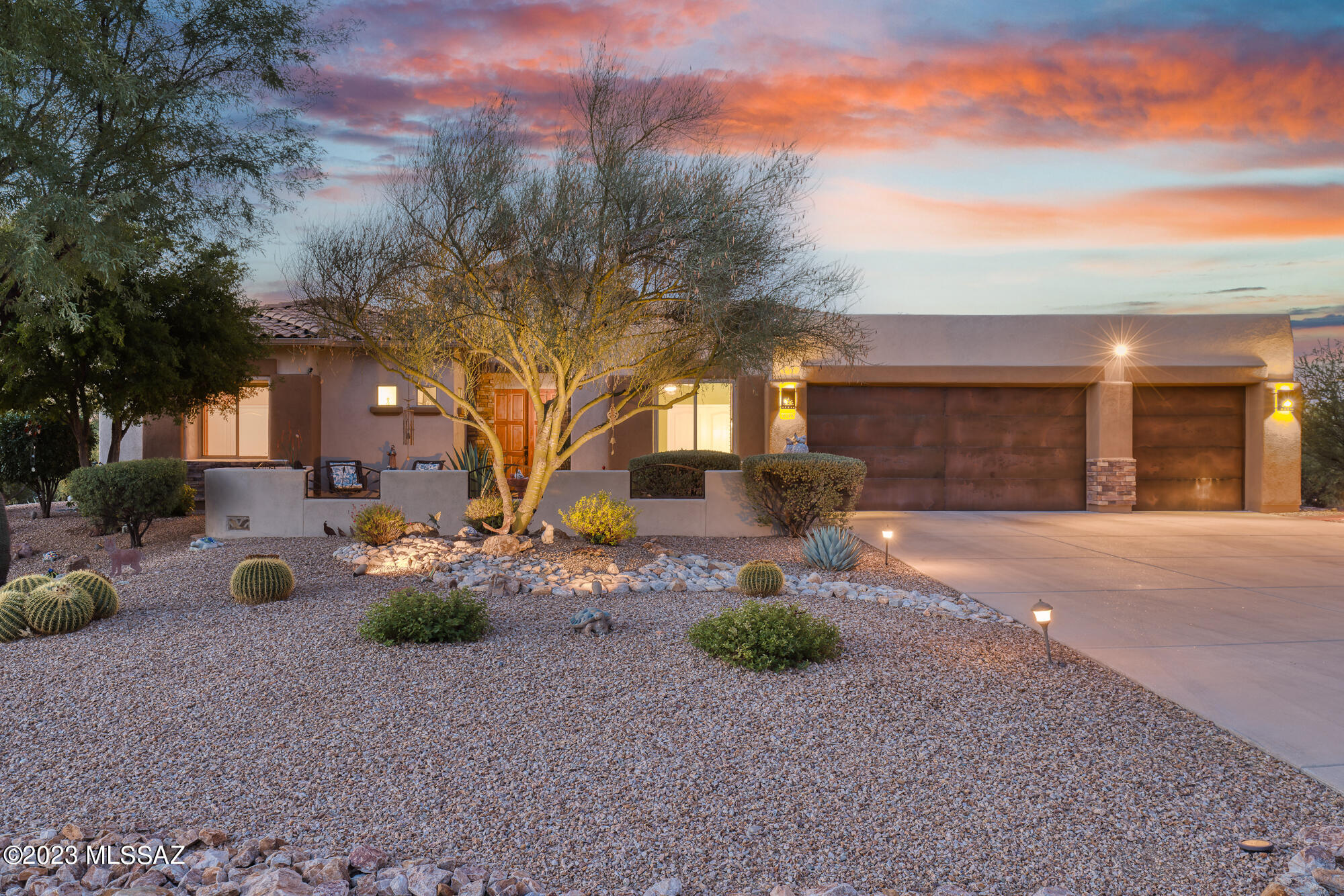 Meticulously maintained, this 4 BR, 2.5 BA, 2,787 Sq Ft private desert retreat in Oro Valley is surrounded by natural desert. The front courtyard imparts a welcoming appearance and beautiful curb appeal, providing the ideal space for your morning coffee. Located in the gated community of Vistoso Gateway and sitting at the end of a of the cul-de-sac, the single level home has a split floor plan anchored by the designer Living Room and Dining Room filled with natural light. Remodeled in 2019, the gourmet kitchen has granite countertops, cherry cabinets, gas cooktop, stainless steel appliances, wine rack and large island with breakfast bar. The Family Room is well situated in an open concept off the Kitchen, leading directly to the serene and private backyard. The extended covered patio is sizable with a gas fire pit and built in barbecue. 

A private hallway leads to the Primary Suite, which has a jacuzzi tub, dual closets, and direct access to the backyard. Two well sized Guest Bedrooms and a Hall Bathroom, while a conveniently located additional third Guest Bedroom makes for an ideal office.

Well thought out details and numerous custom upgrades provide a comfortable but high design. Plantation shutters, high ceilings, three car garage, large lot over an acre, open floor plan, and fantastic location.

Oro Valley, is known for its attractive features that make it a desirable place to live.

Scenic Beauty: Oro Valley is surrounded by stunning desert landscapes and the scenic Santa Catalina Mountains. The picturesque views and natural beauty provide a serene and visually pleasing environment.

Outdoor Recreation: The region offers numerous outdoor recreational activities, including hiking, biking, golfing, and bird watching. Catalina State Park is a popular destination for hiking and nature enthusiasts.

Climate: Oro Valley has a warm climate with plenty of sunshine, making it an attractive option for those who enjoy mild winters and hot summers. The climate supports outdoor activities throughout the year.

Education: The town has well-regarded schools, and the community places a strong emphasis on education. Quality schools can be an essential factor for families considering a move to a new area.

Safe Community: Oro Valley is often recognized for its low crime rates, contributing to a sense of safety and security for residents.

Cultural and Arts Scene: Despite its relatively small size, Oro Valley has a growing cultural and arts scene. The town hosts events, galleries, and performances that contribute to a vibrant cultural atmosphere.

Community Events: Oro Valley organizes various community events and festivals throughout the year, fostering a sense of community and providing opportunities for residents to come together.

Proximity to Tucson: Oro Valley is located just north of Tucson, offering residents easy access to the amenities and cultural attractions of a larger city while still maintaining a more suburban or small-town feel.

Retirement Destination: The town has become a popular destination for retirees due to its pleasant climate, outdoor activities, and a generally peaceful lifestyle.

Economic Opportunities: The area has experienced economic growth, and there are opportunities for employment, particularly in healthcare, education, and technology sectors.