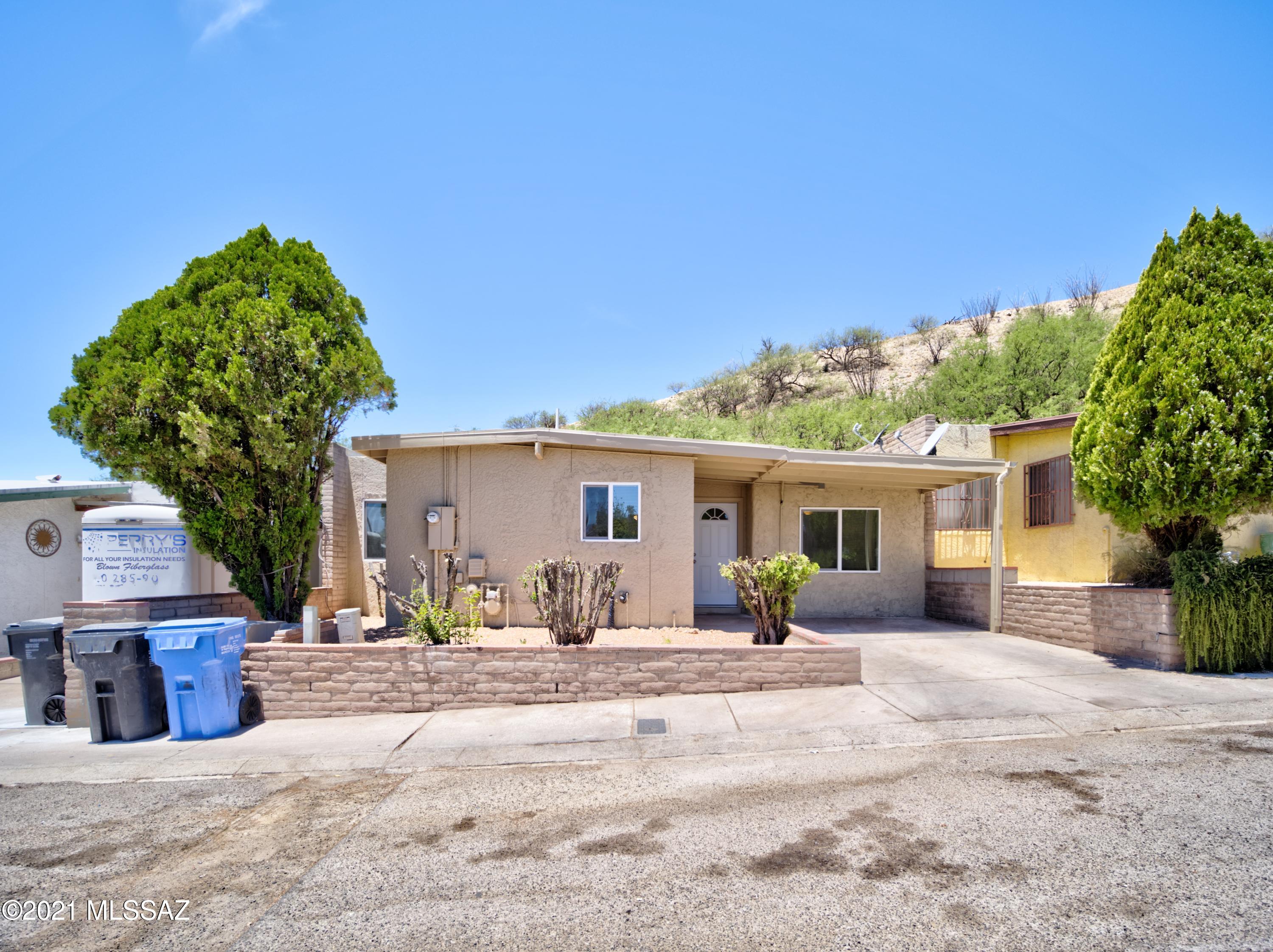 This nice home features, new tile flooring throughout the house, master bedroom walk-in closet features laminate flooring Two bathrooms were remodeled and master bedroom was extended in area. New toilets, vanities and lights in both bathrooms. New windows all around except one bedroom. New interior and exterior doors including a new glass sliding door in the back of the house. All walls and ceilings we recovered with new finish. New interior and exterior paint. New AC/Heating units-one of 3 tons and one of 1 ton in master bedroom. Kitchen cabinets were refurnished and new Formica countertops we installed, new sink and faucets,  new range hood. New ceiling fans in bedroom and living room. New ceiling and wall lamps. Bedrooms closet were remodeled, new sliding glass door were installed