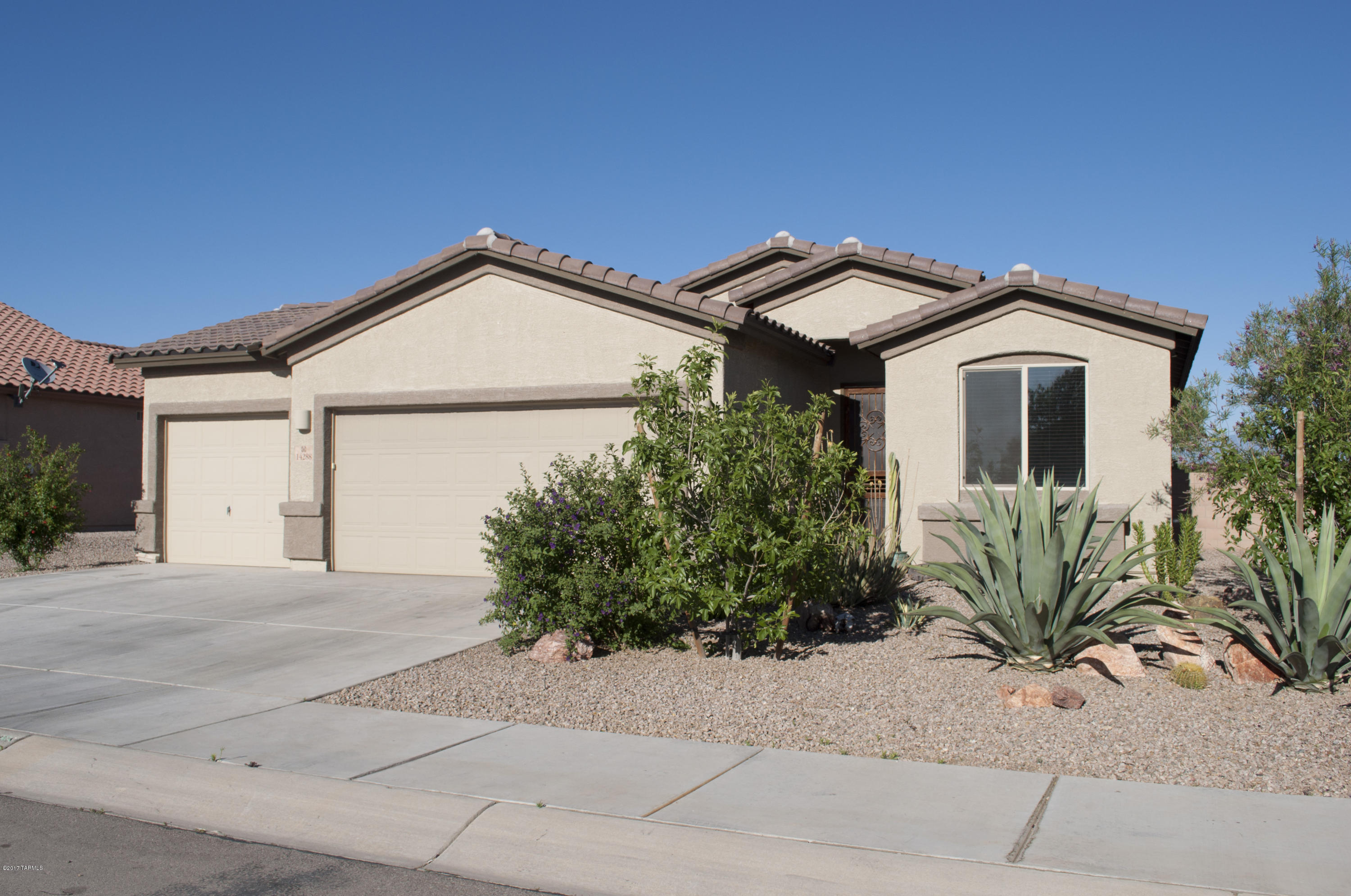 Located in the San Lucas neighborhood, perfectly situated on the very back of the community on a premium lot with 25 miles of state land directly behind its walls. The views of the sprawling mountains will never be blocked by another build and the picturesque desert mountains make this home feel secluded. Boasting a 3 car garage that has been updated into a hobbyists dream with a fully plumbed slim mount swamp cooler, 220 plug, extra wiring and extra LED lighting- this garage is meant to be used for more than car storage! The perfect house for a furry family, the dog door leads to a separated, graveled, yard just for the dogs, leaving the bohemian garden paradise just for you to enjoy. Fully landscaped and drip irrigated the back yard, covered patio, updated master and more.
